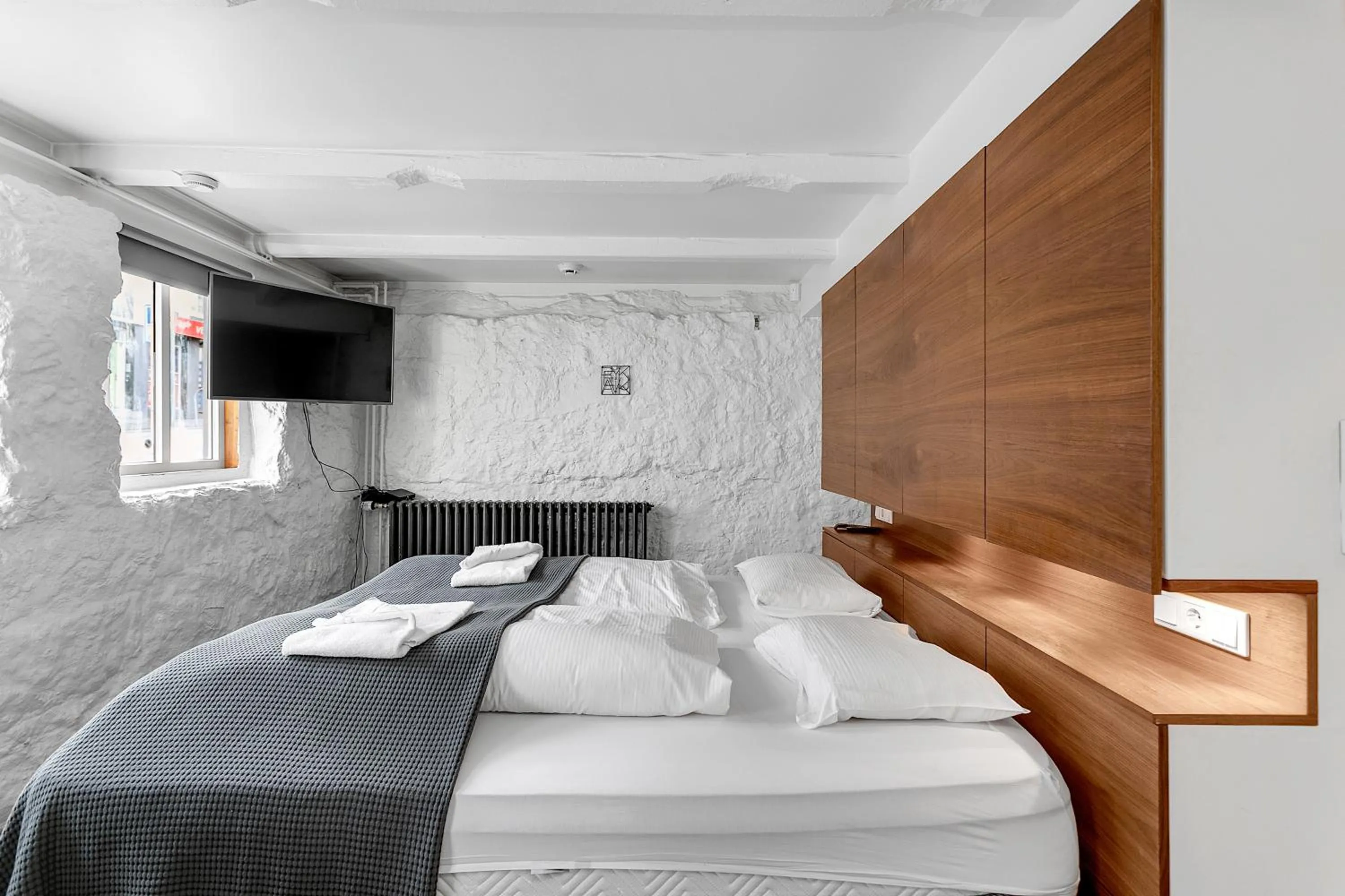 Bed in Baron Downtown Apartments by Heimaleiga