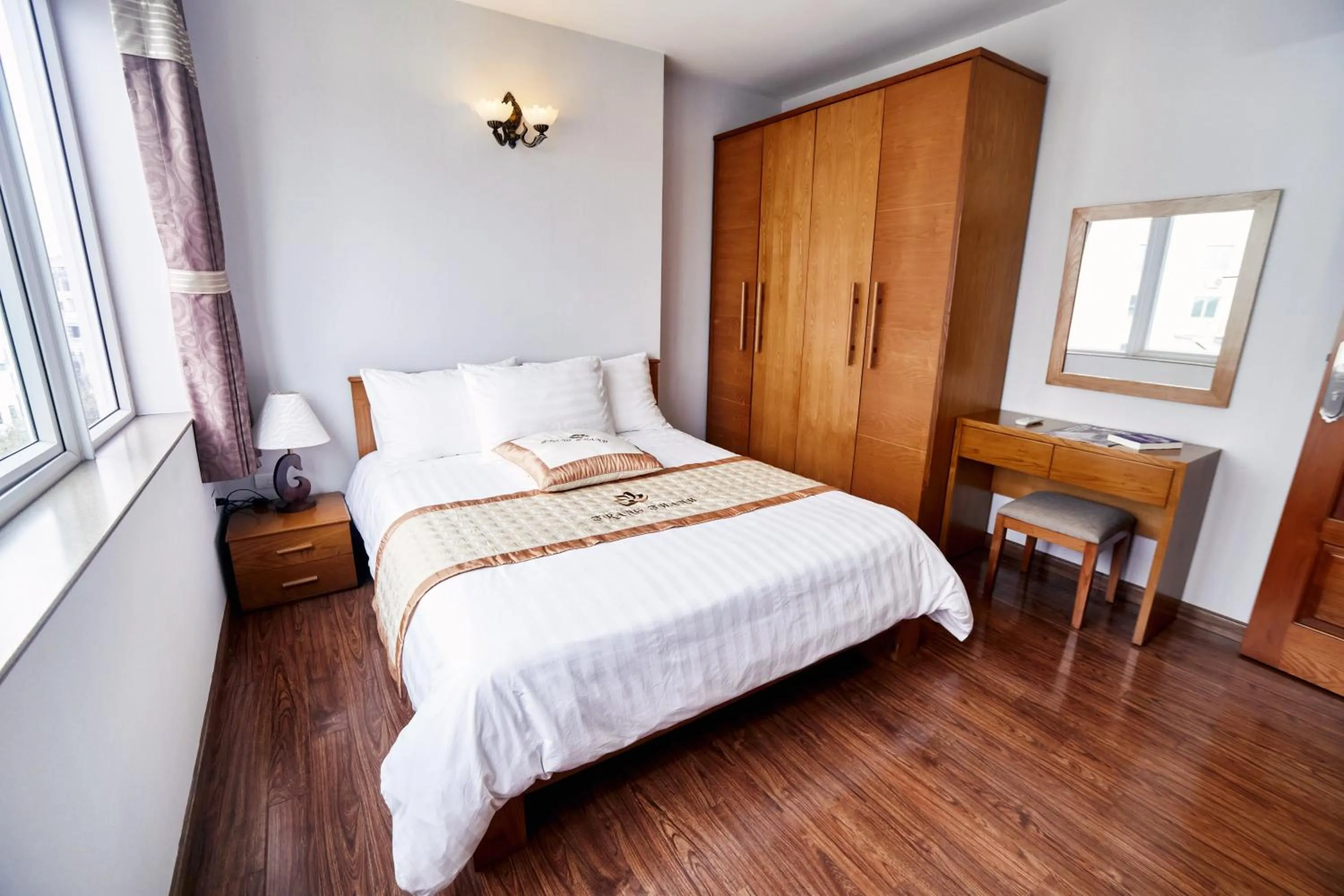 Bed in Trang Thanh Luxury Apartment