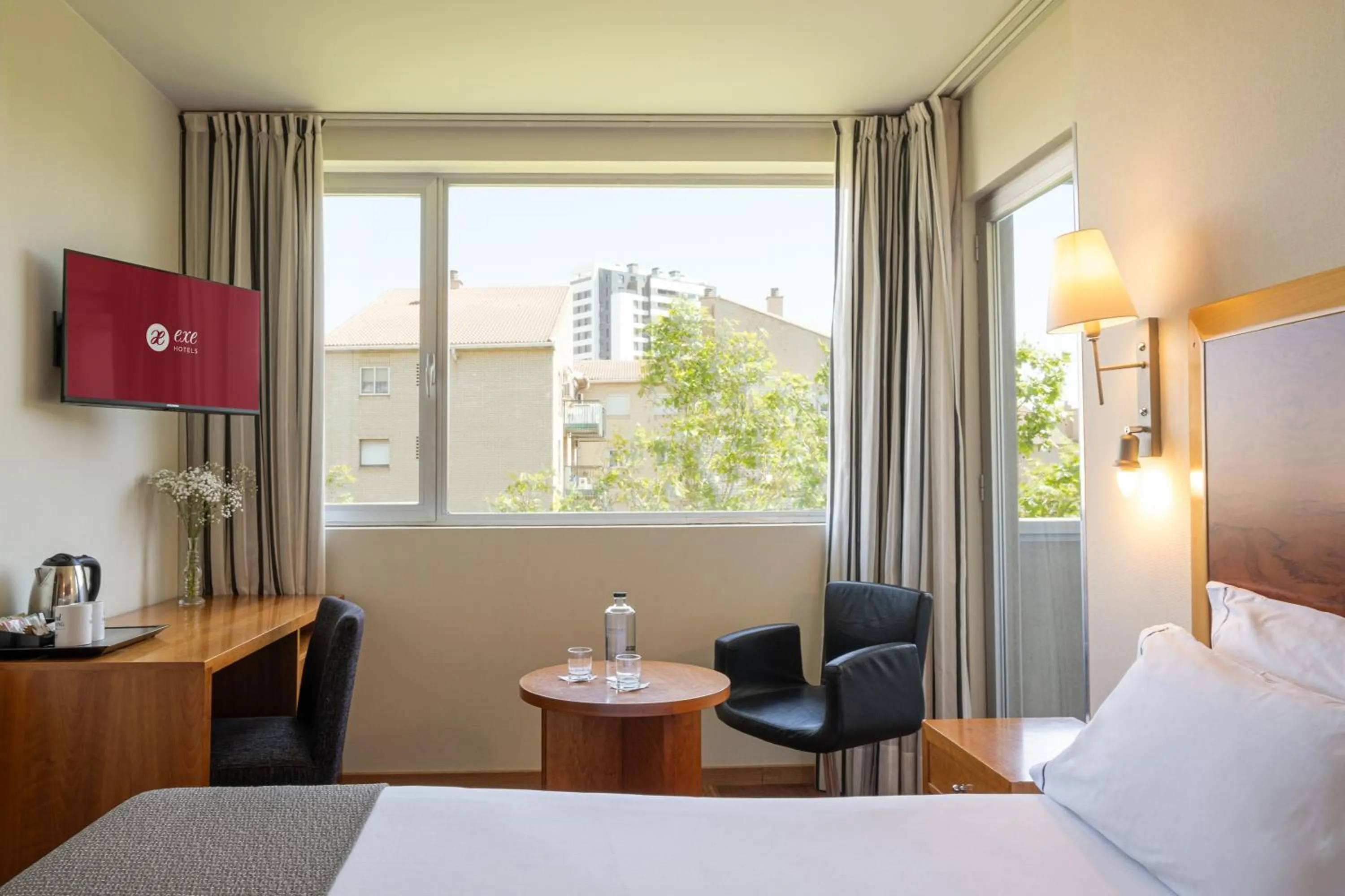 Photo of the whole room, Bed in Exe Plaza Delicias