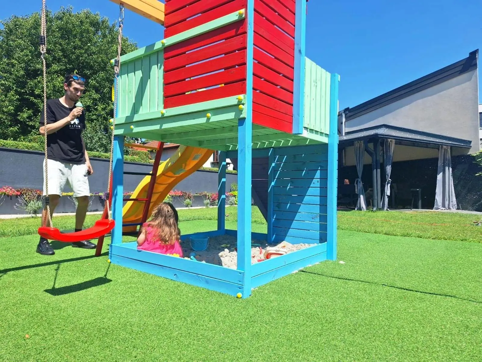 Children play ground in Arcobaleno Apartments & Rooms