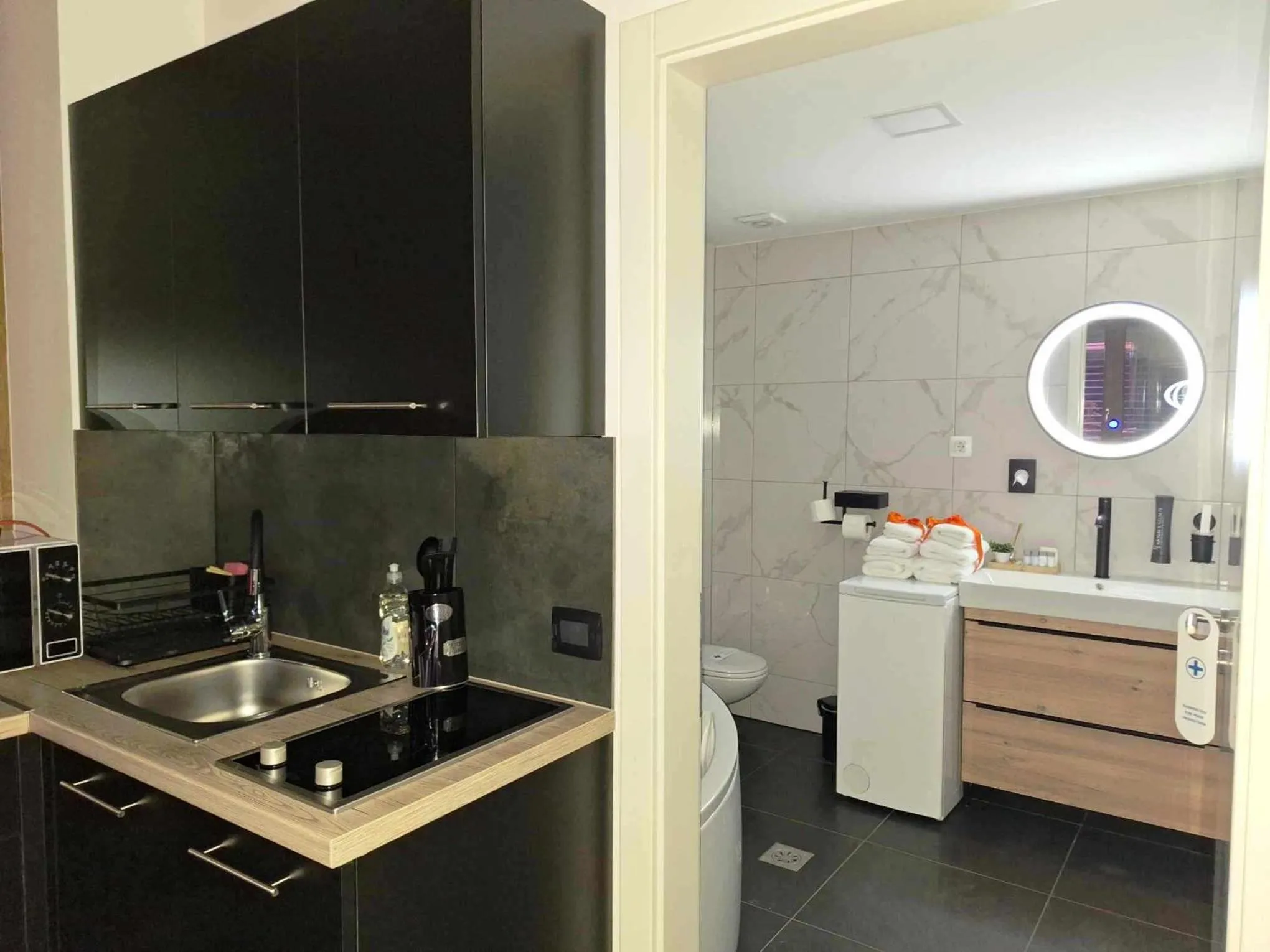 Bathroom in Arcobaleno Apartments & Rooms