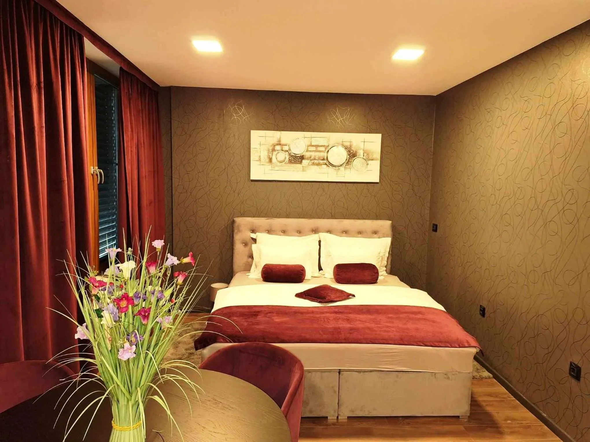Bed in Arcobaleno Apartments & Rooms