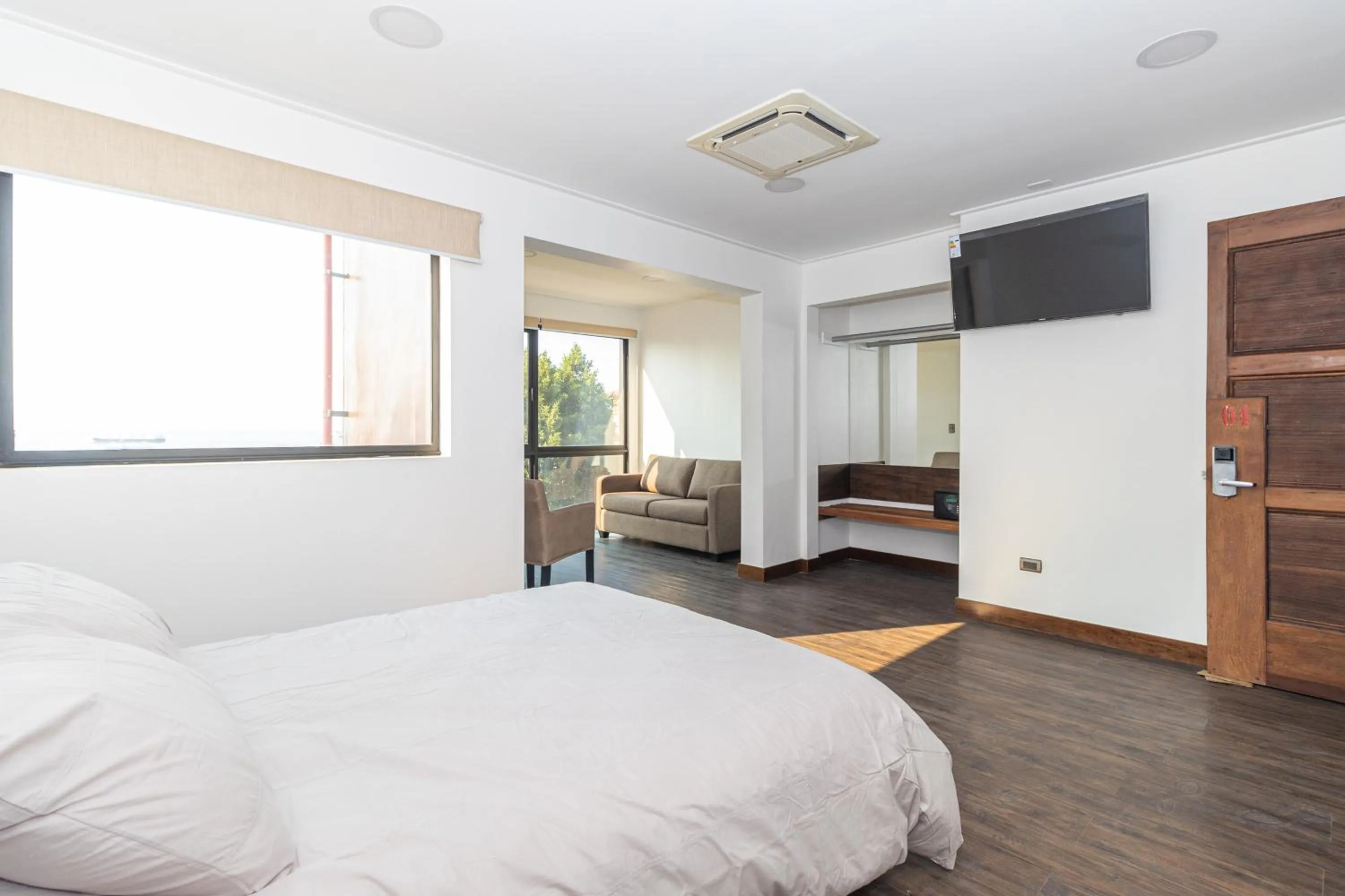 Communal lounge/ TV room, Bed in Hotel Boutique Ossido Nero