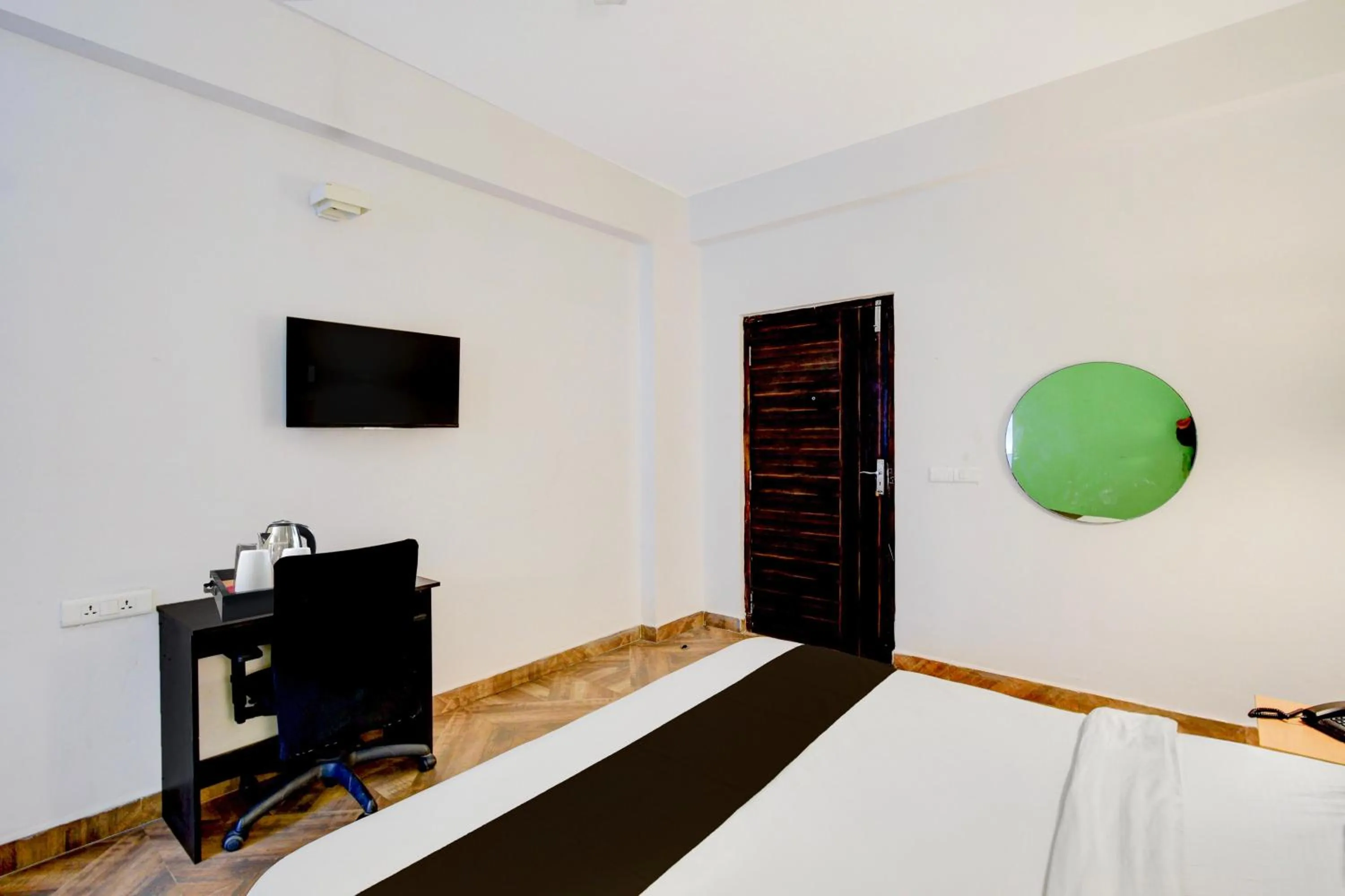 Bedroom, Bed in Super Townhouse SR Nagar Metro Station Hyderabad