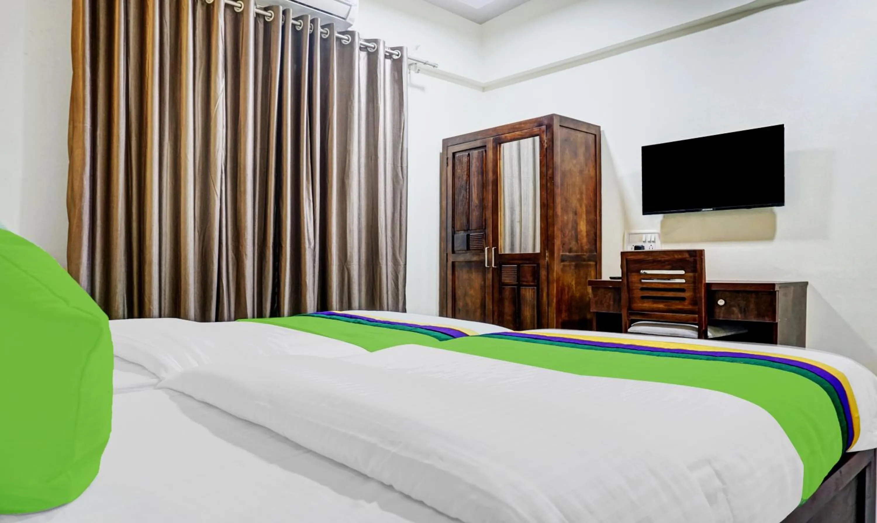 Bedroom, Bed in Treebo Tulip