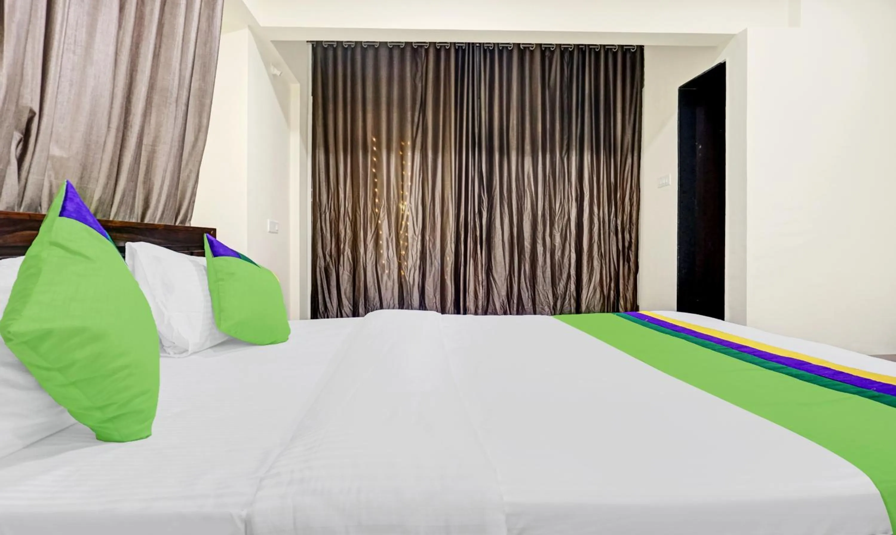 Bedroom, Bed in Treebo Tulip