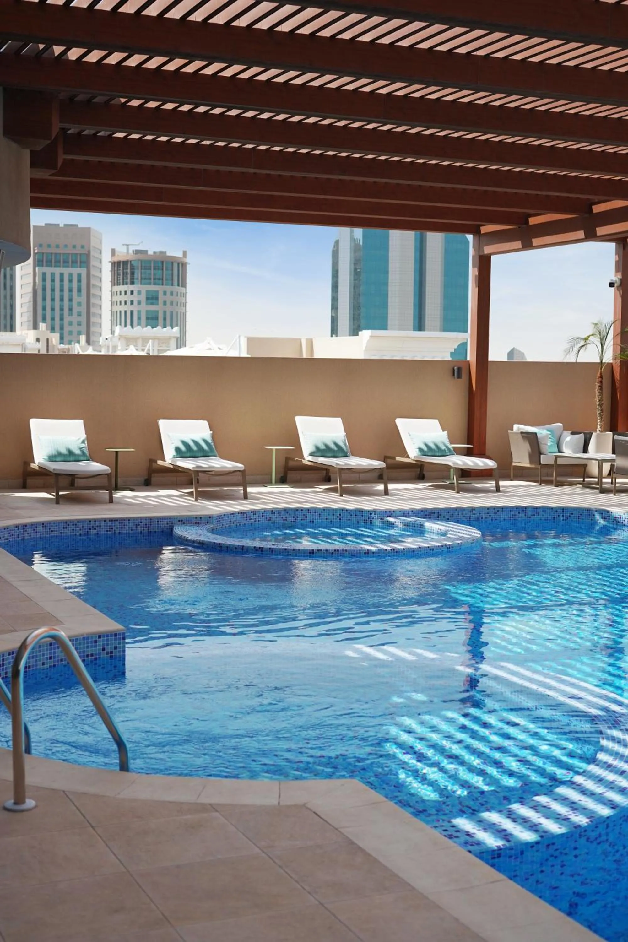 Swimming pool in La Maison Hotel Doha