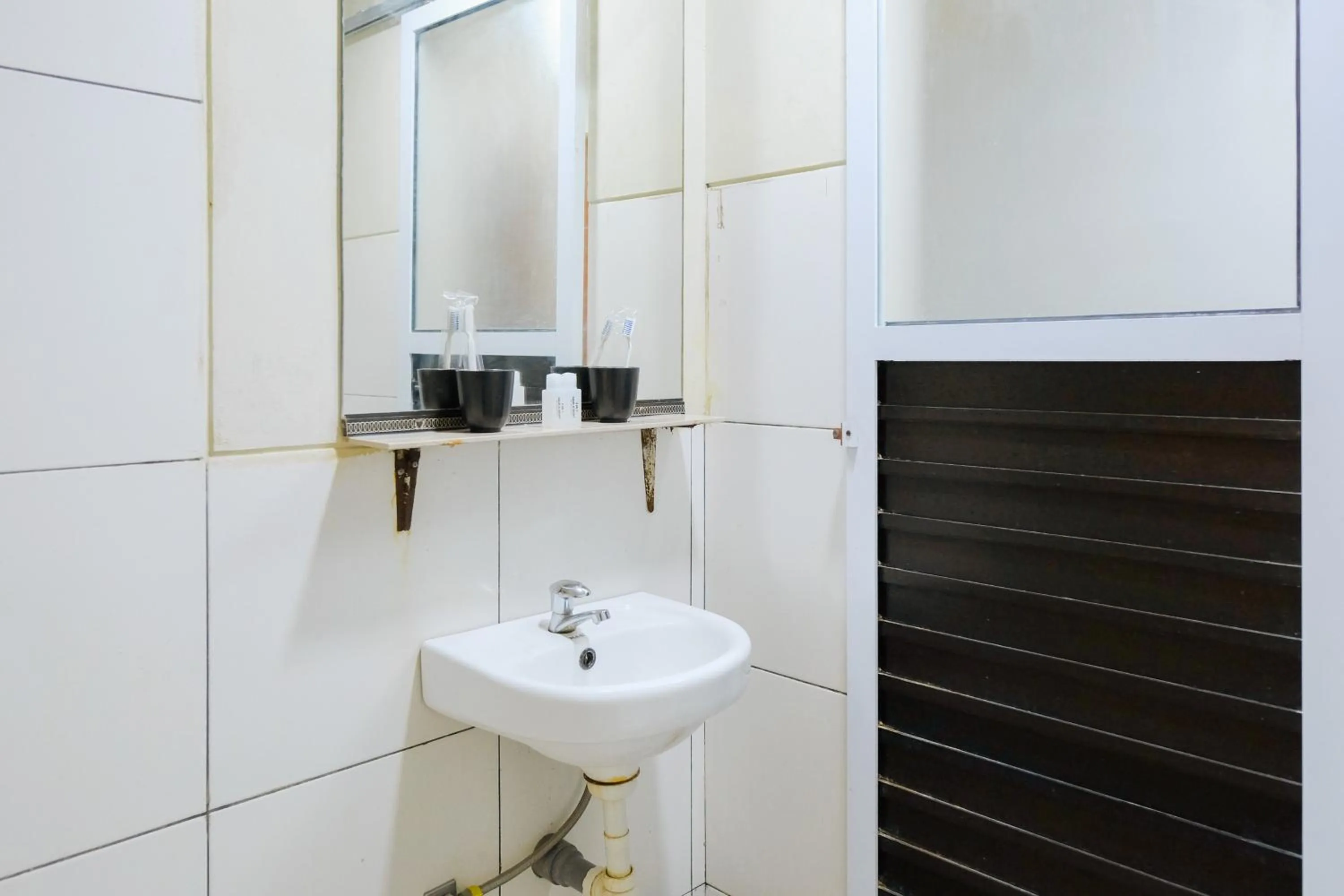 Bathroom in Sans Hotel Havila Bengkulu