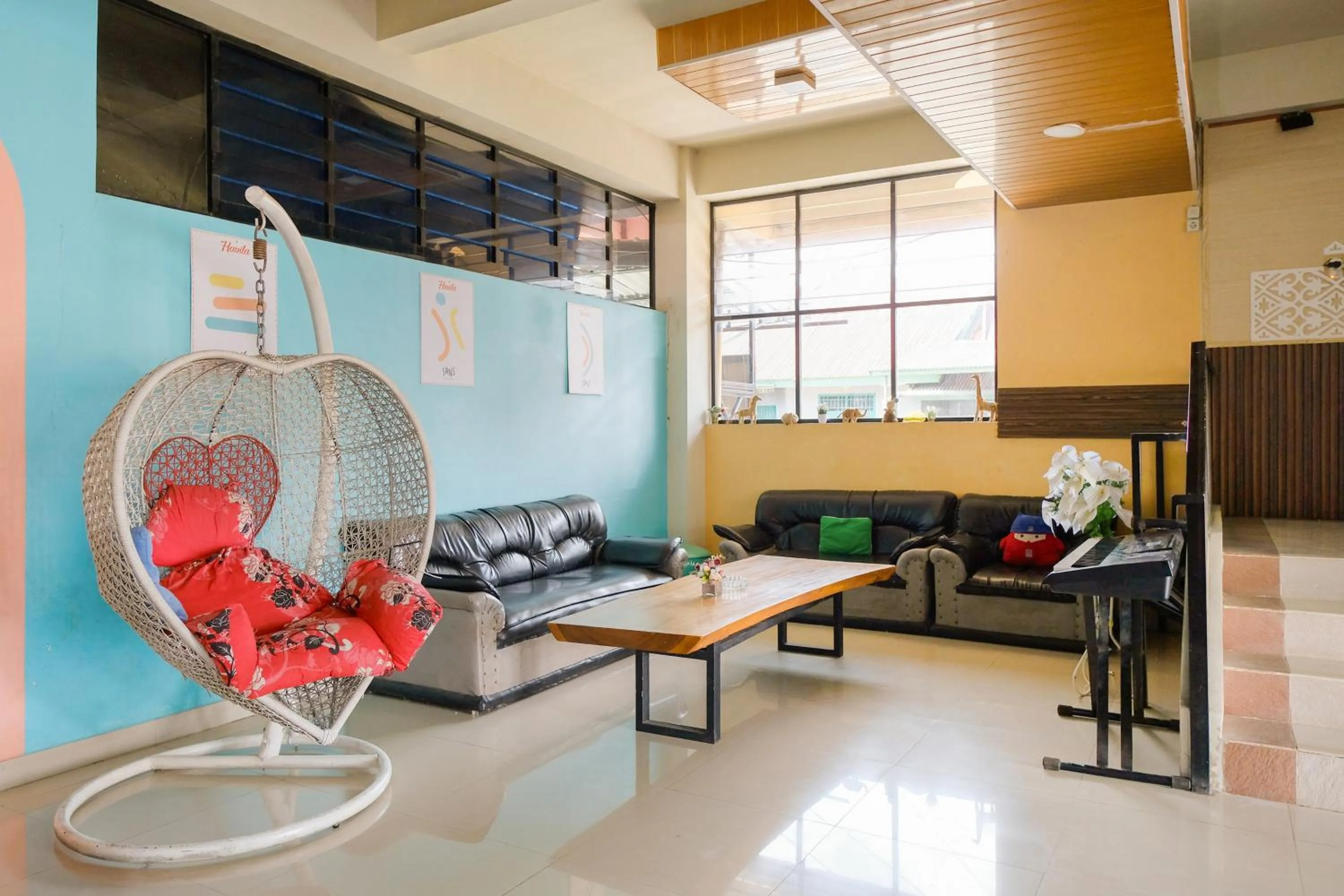Seating area in Sans Hotel Havila Bengkulu