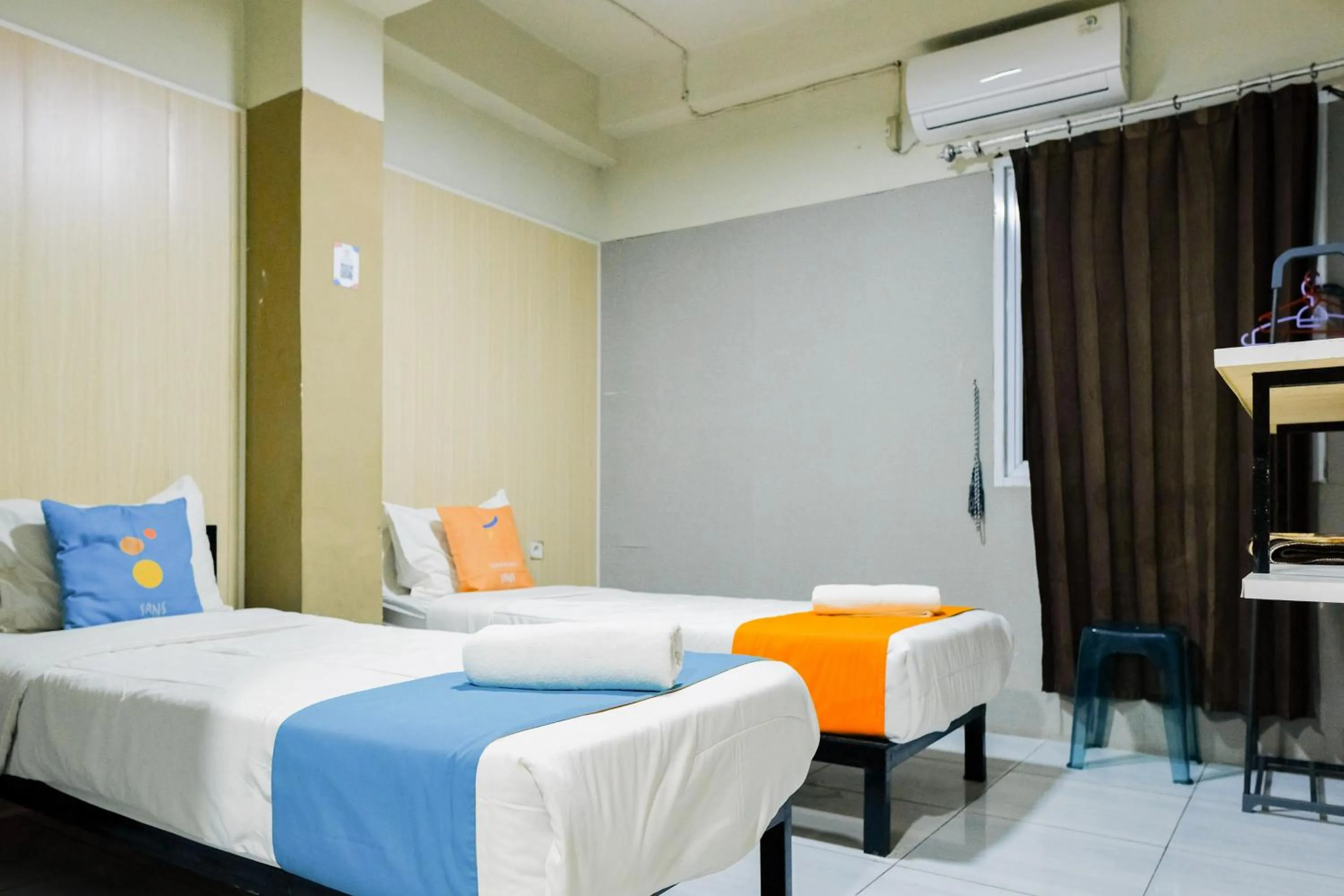 Bedroom, Bed in Sans Hotel Havila Bengkulu