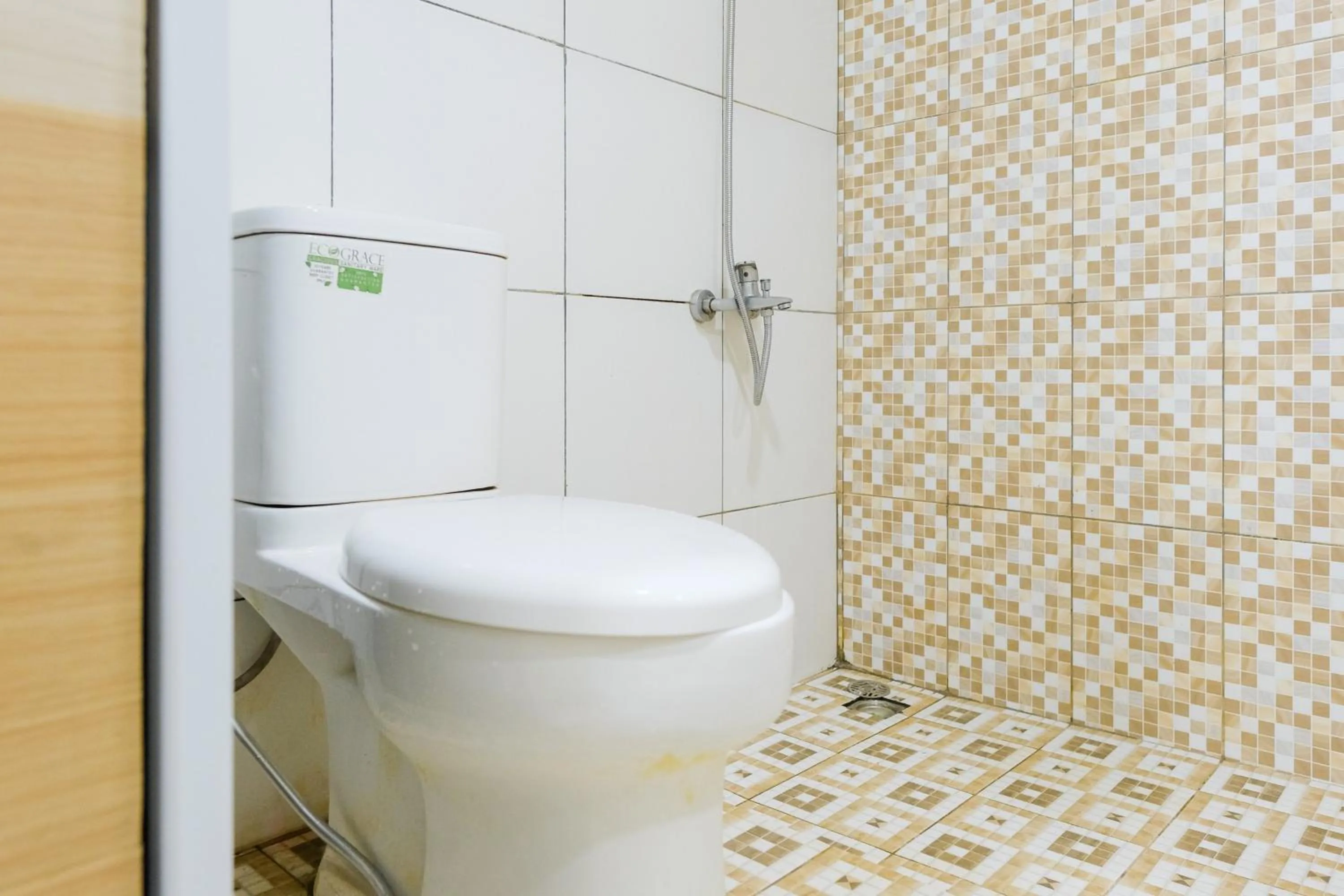 Bathroom in Sans Hotel Havila Bengkulu