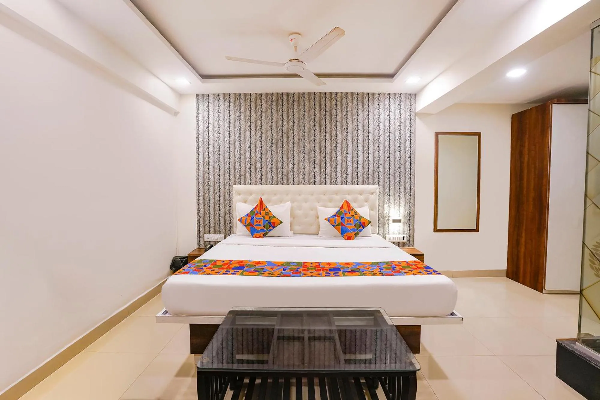 Bed in FabHotel Arsh Executive Inn