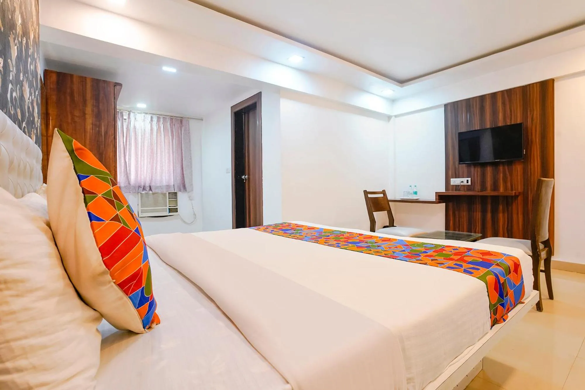 Bed in FabHotel Arsh Executive Inn