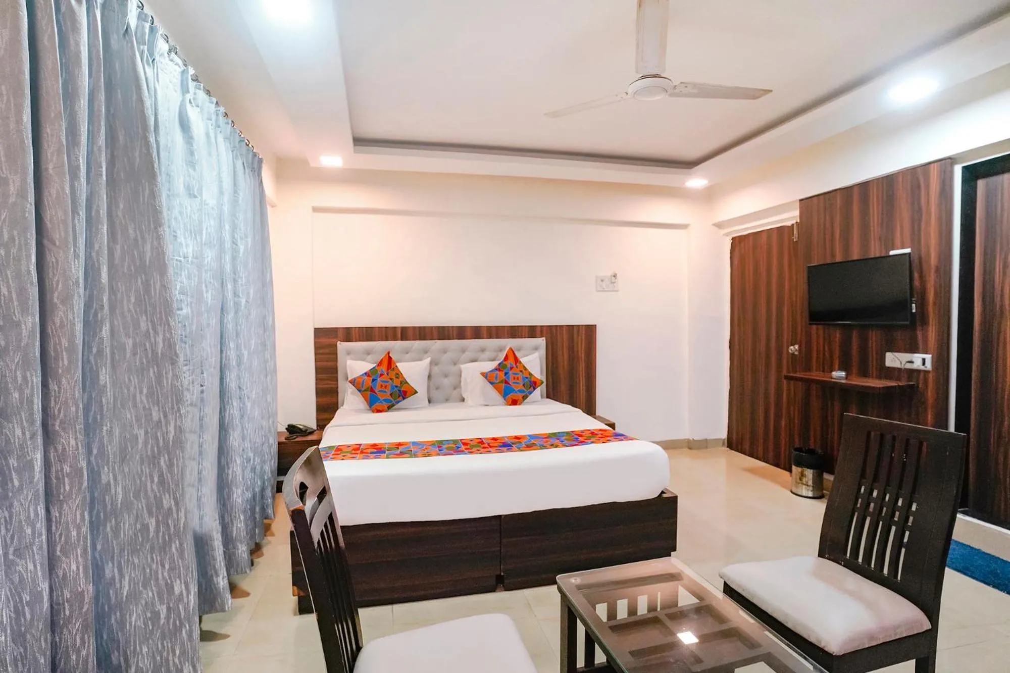 Bed in FabHotel Arsh Executive Inn