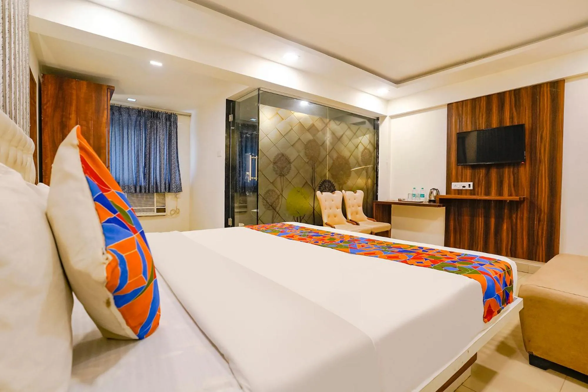 Bed in FabHotel Arsh Executive Inn