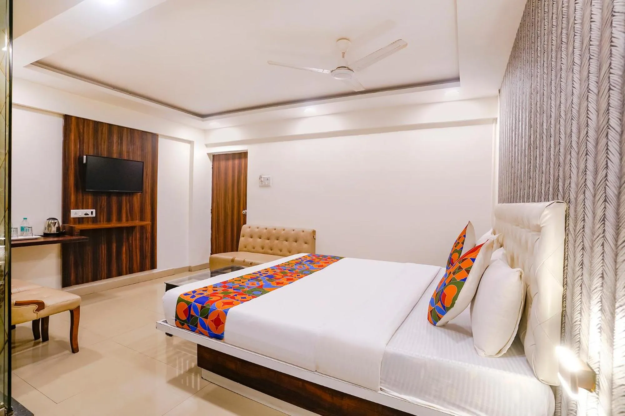 Bed in FabHotel Arsh Executive Inn