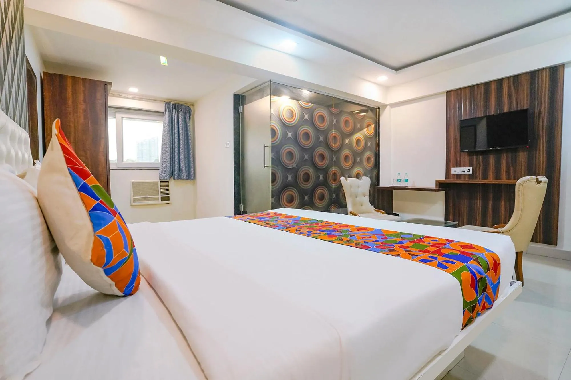 Bed in FabHotel Arsh Executive Inn