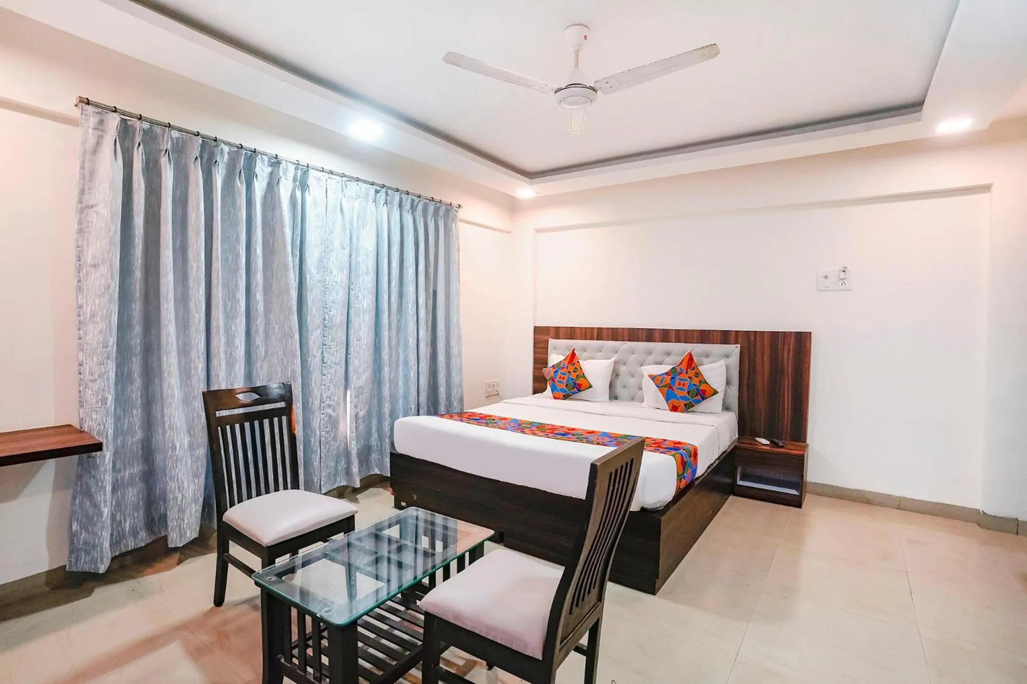 Bed in FabHotel Arsh Executive Inn