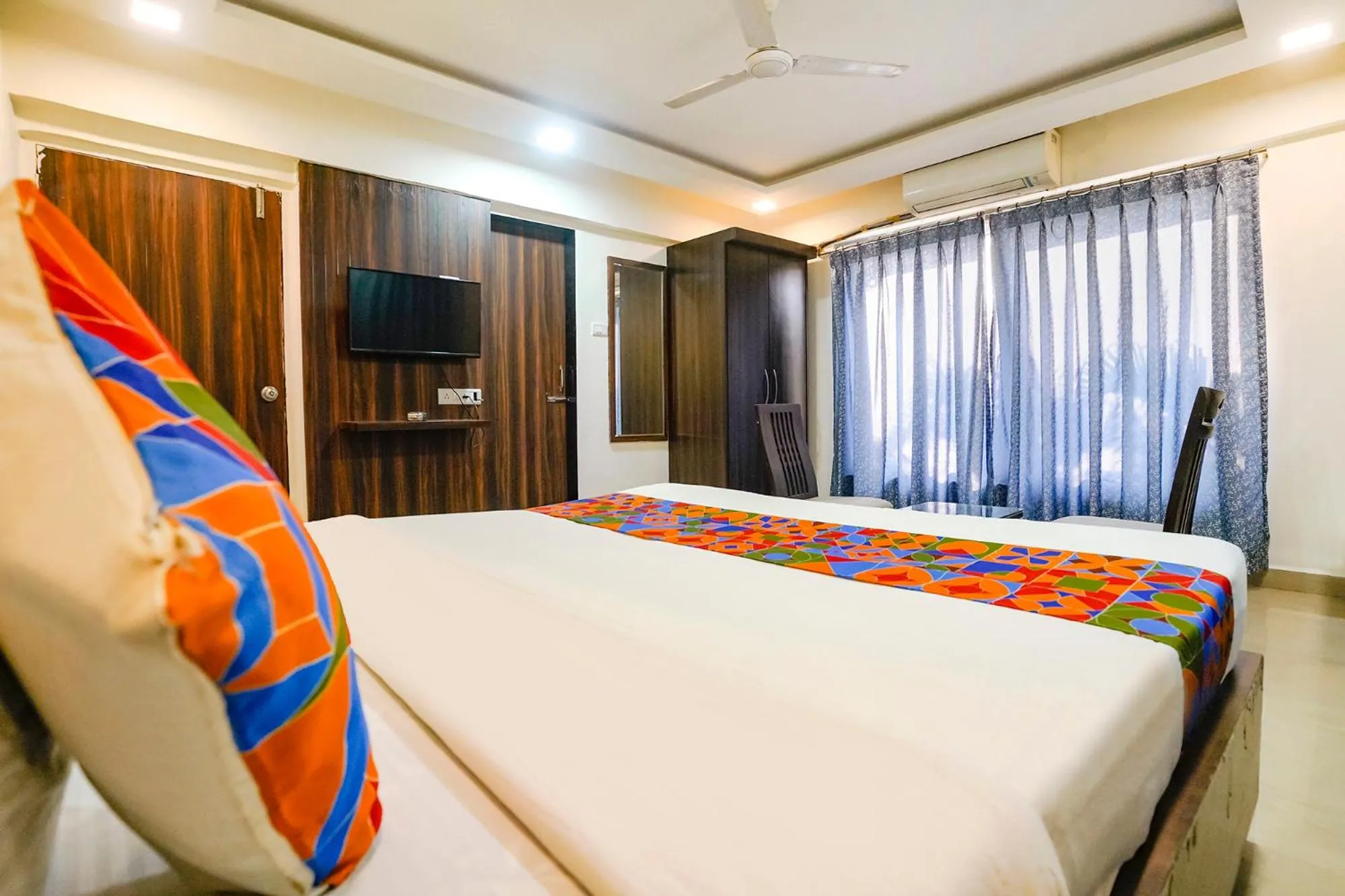 Bed in FabHotel Arsh Executive Inn