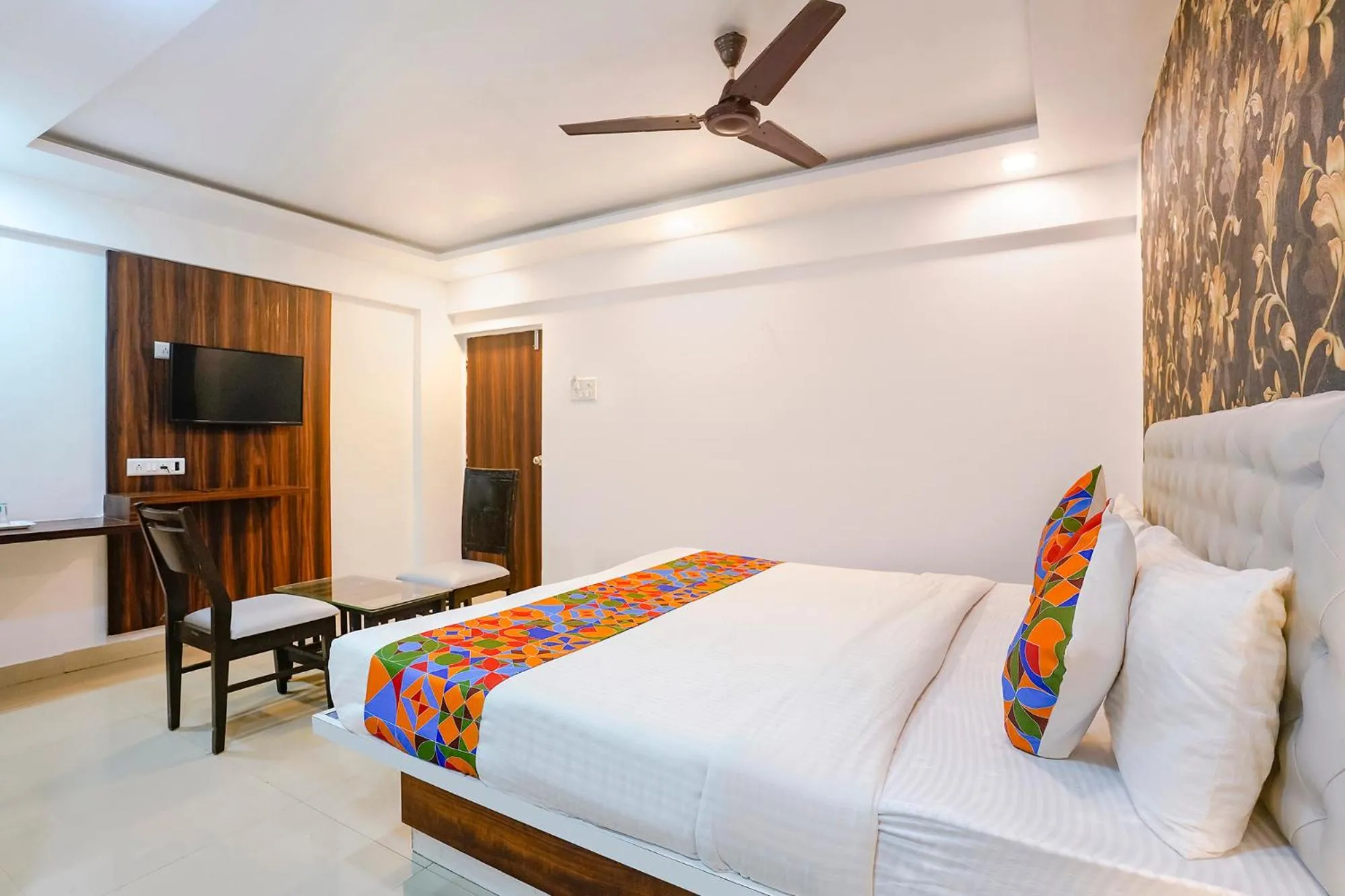 Bed in FabHotel Arsh Executive Inn