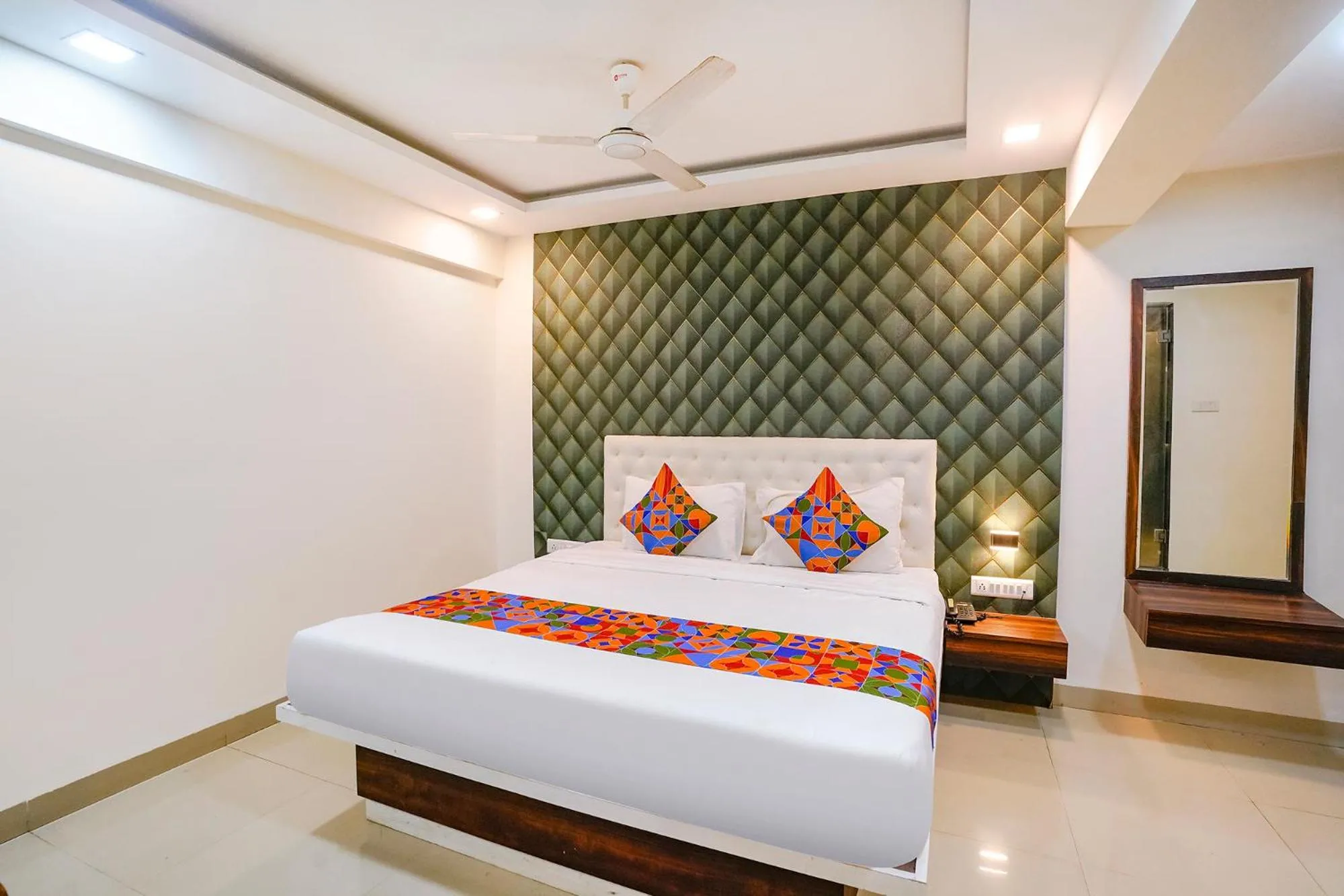 Bed in FabHotel Arsh Executive Inn