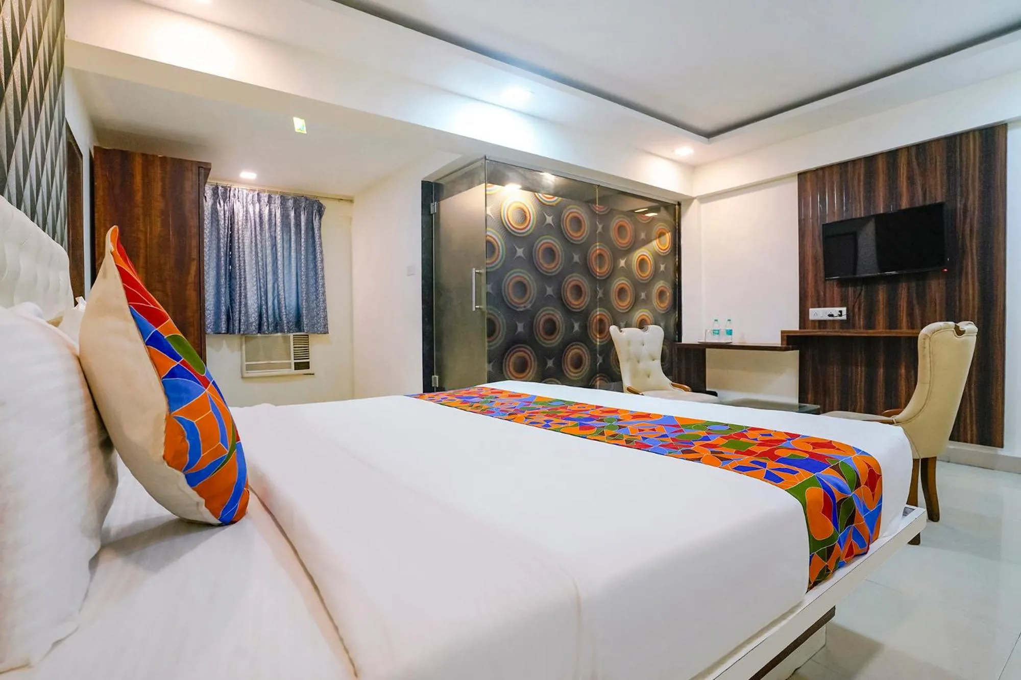Bed in FabHotel Arsh Executive Inn