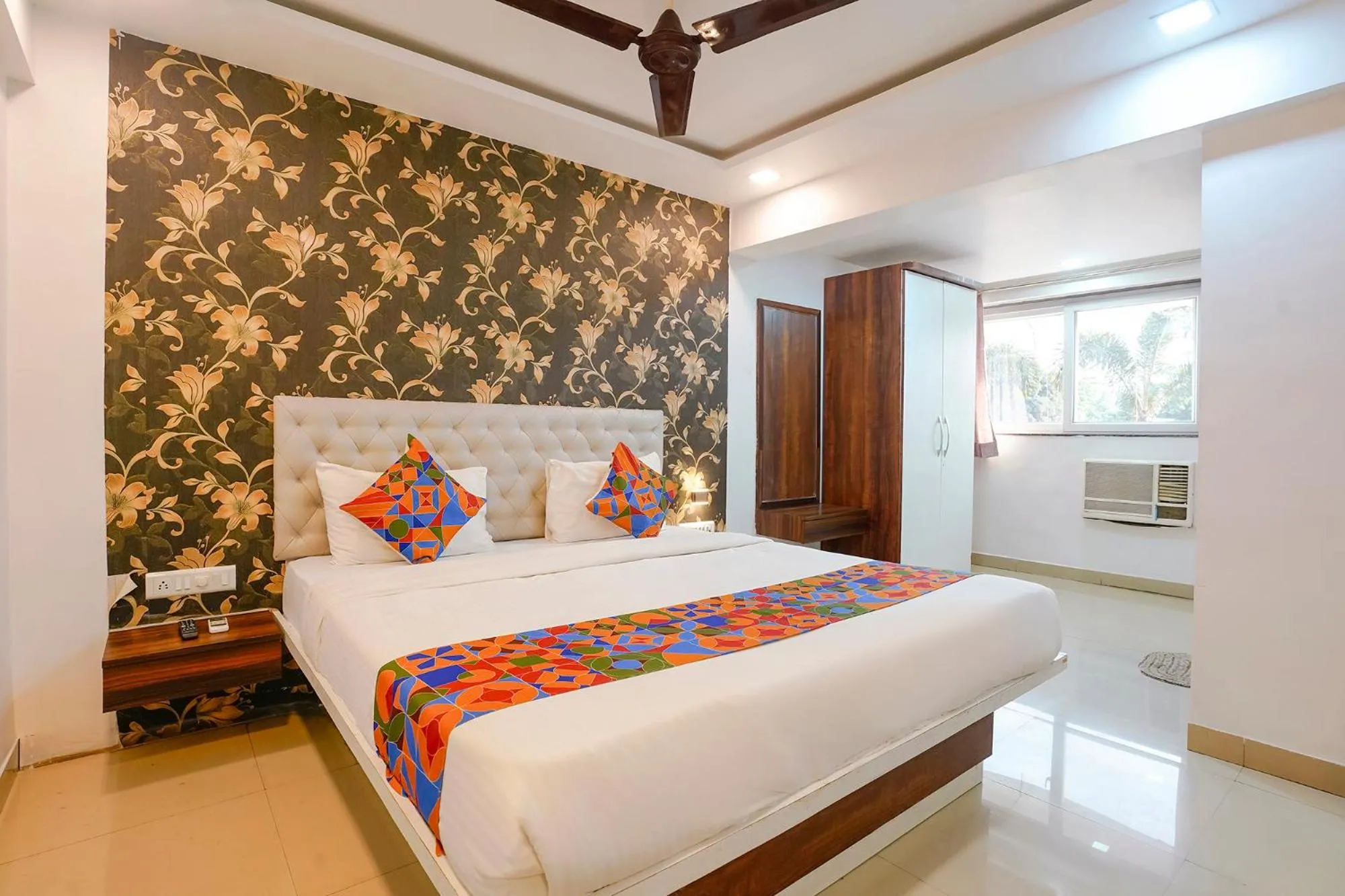 Bed in FabHotel Arsh Executive Inn
