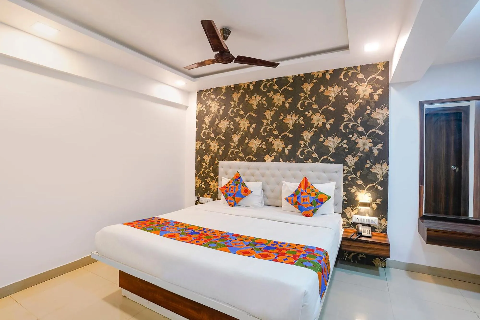 Bed in FabHotel Arsh Executive Inn