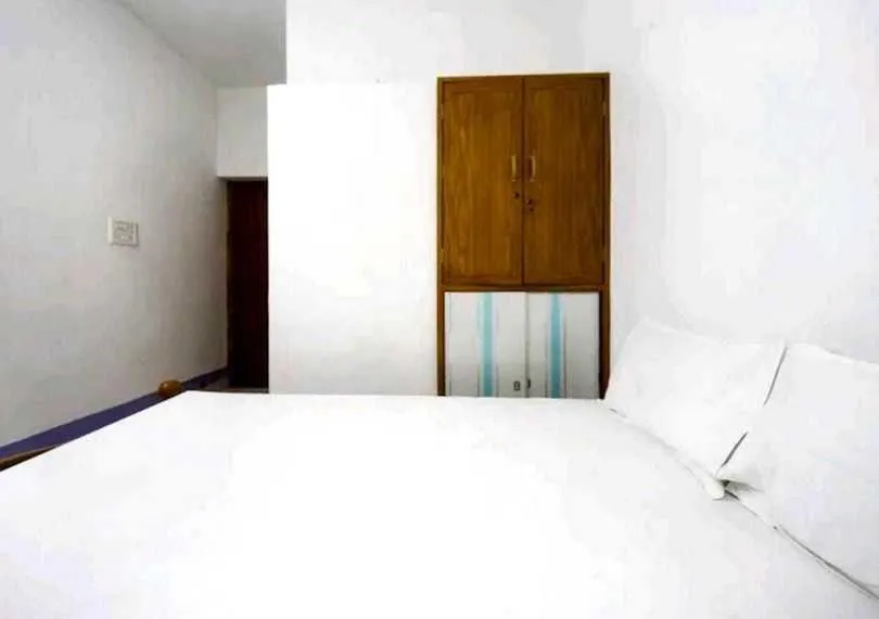 Bedroom in Hotel O SHAPPY INN KOYAMBEDU
