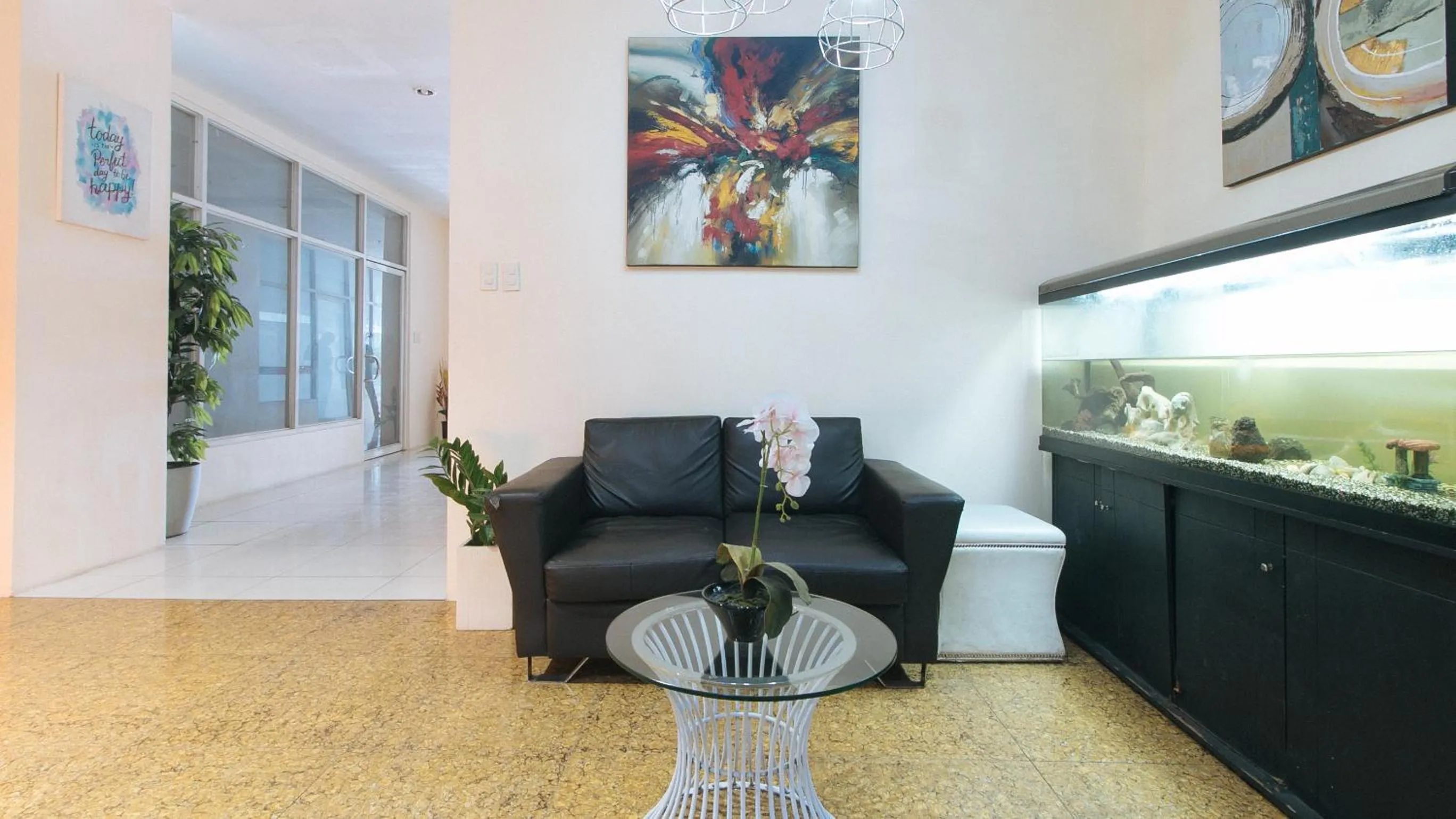 Living room in RedDoorz @ Melbourne Suites Makati