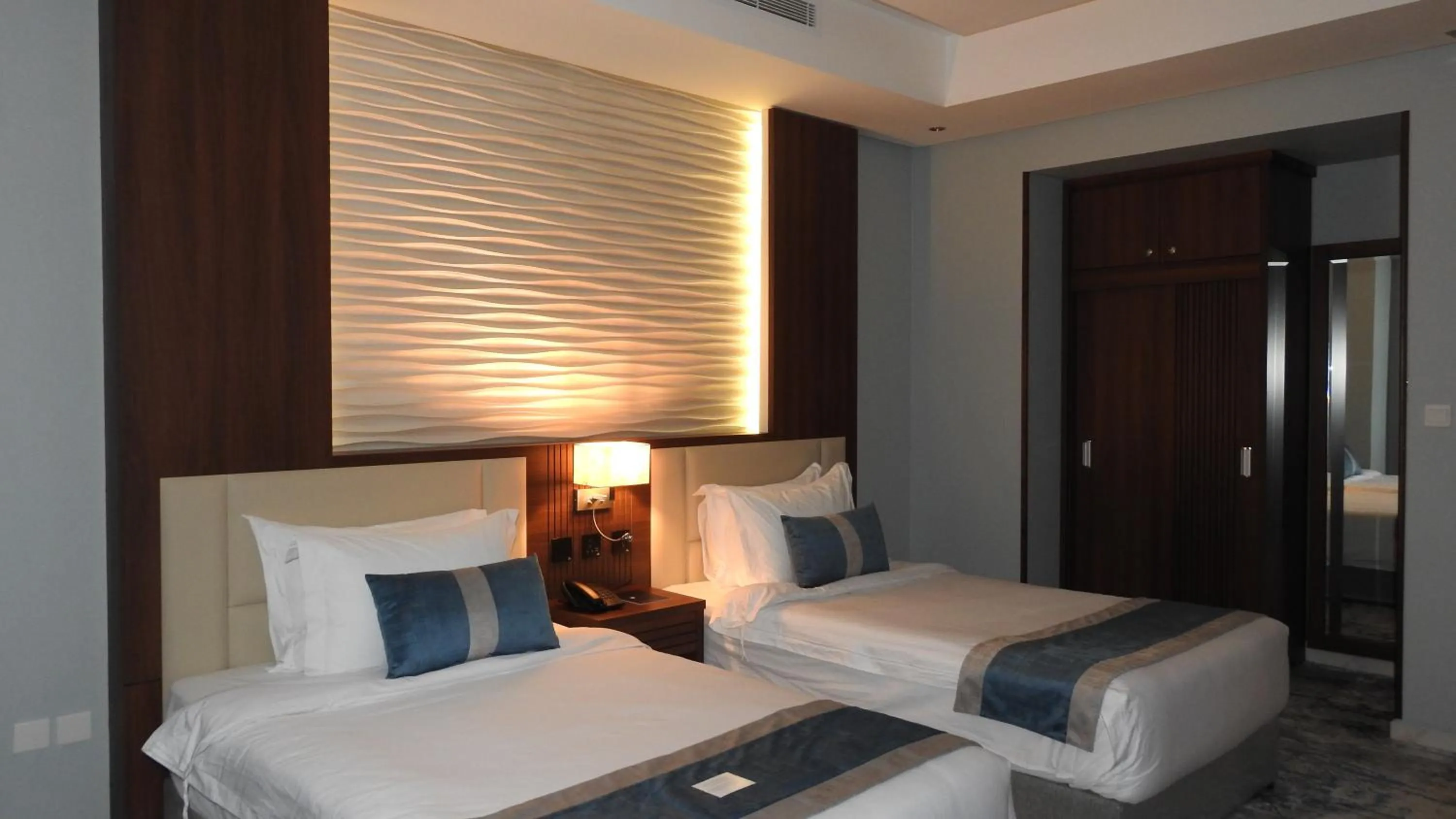 Bed in Level Nine Hotel