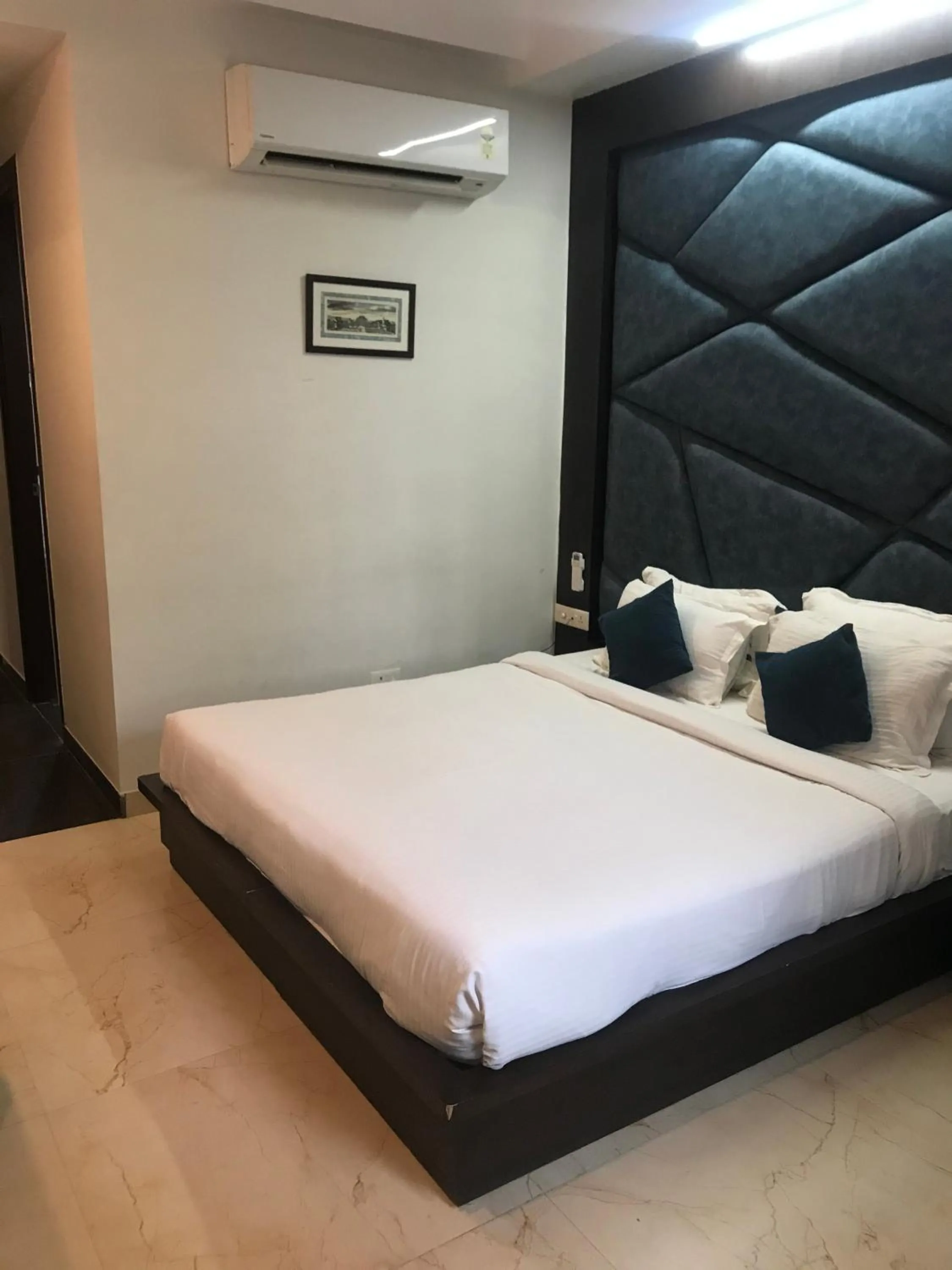 Bed in Hotel Crimson Palace