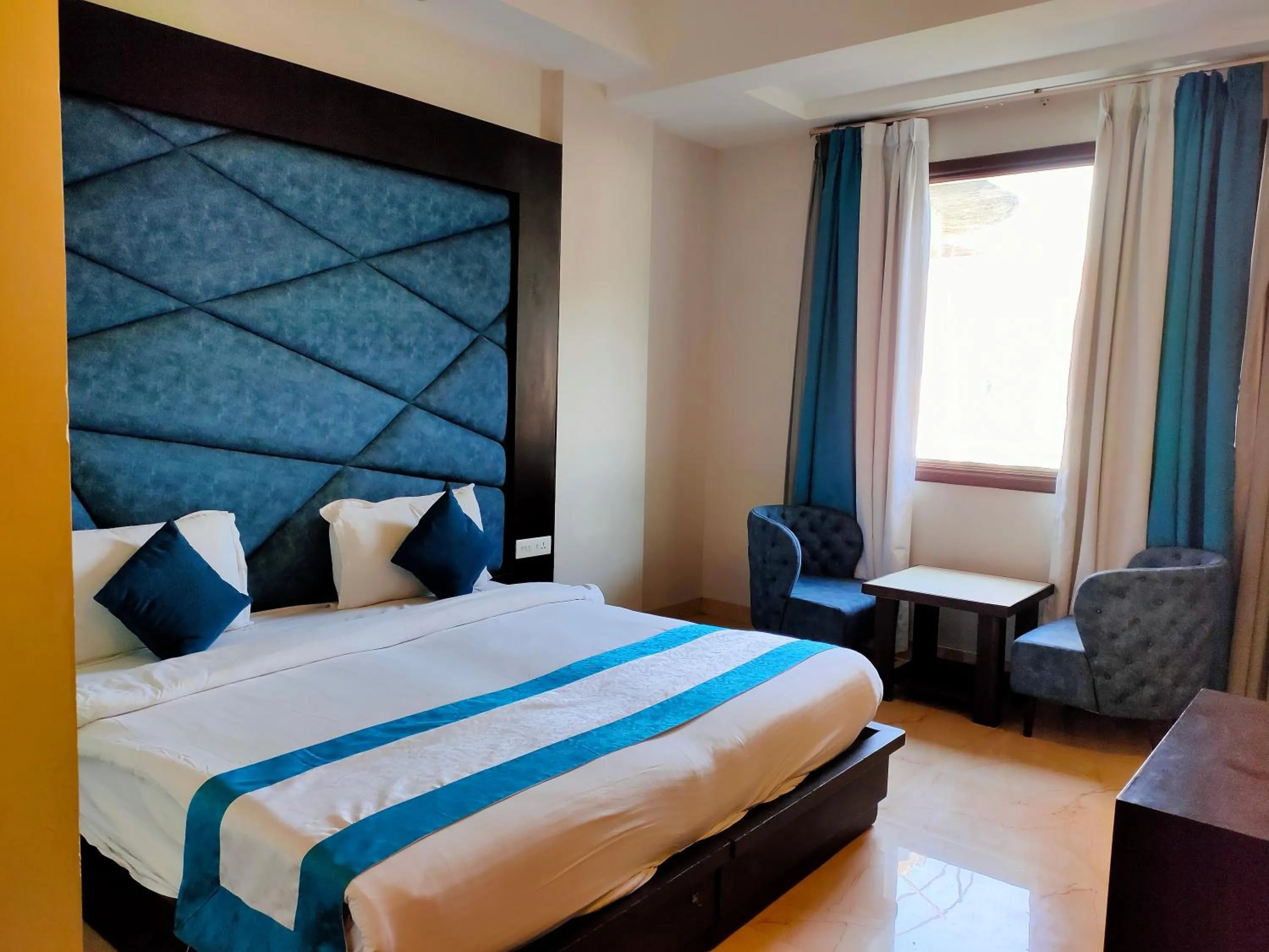 Bed in Hotel Crimson Palace