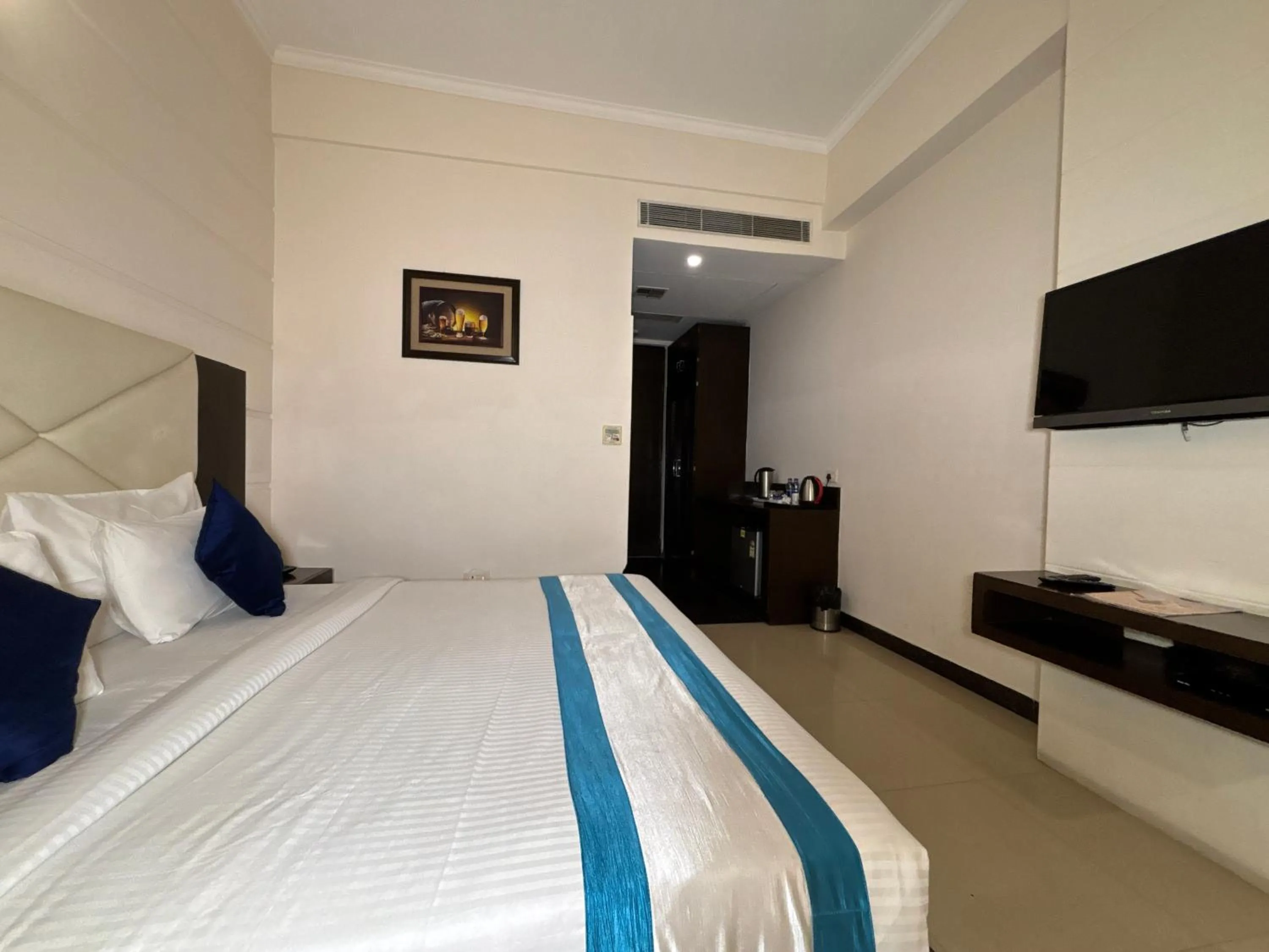 Bed in Hotel Crimson Palace