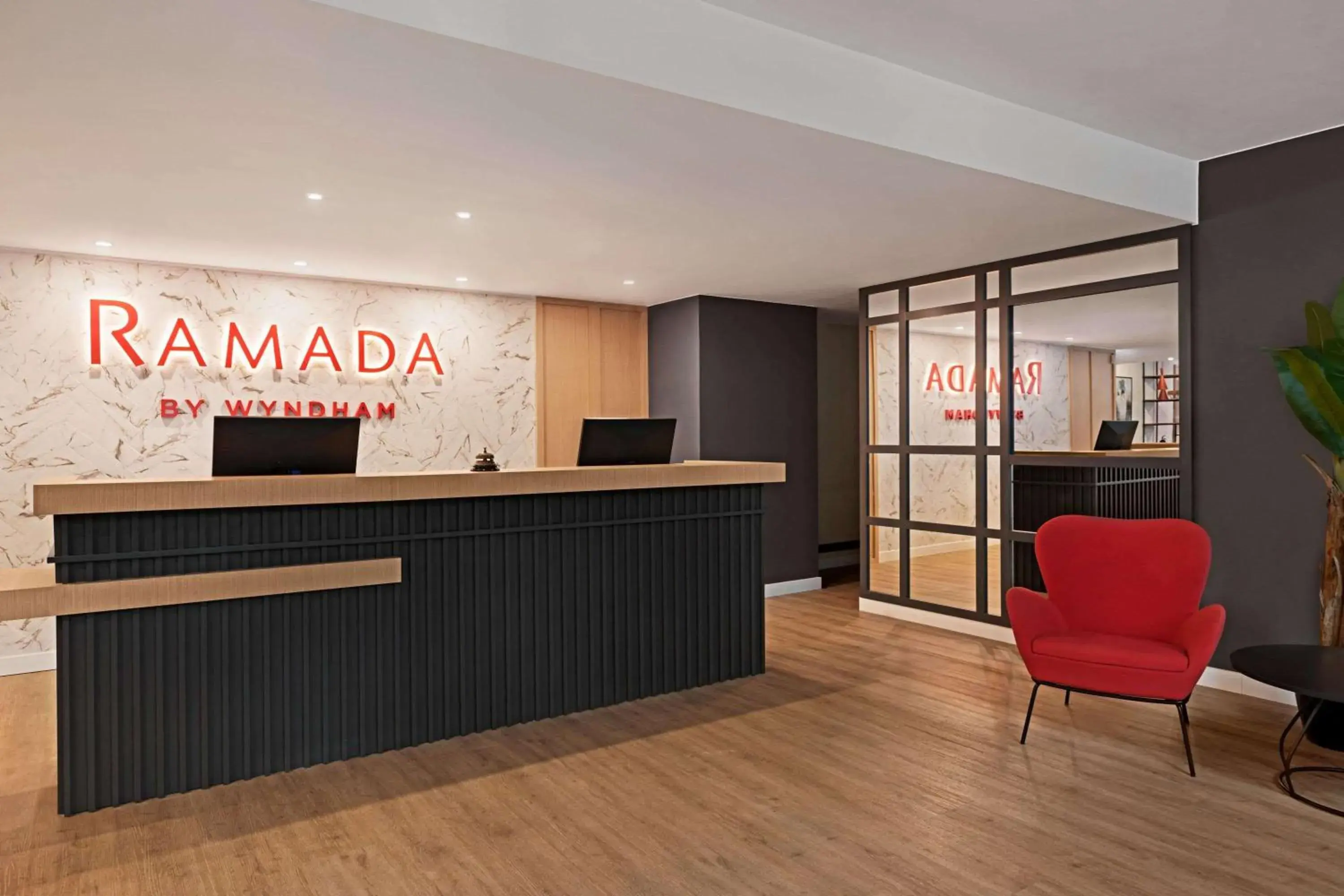 Lobby or reception in Ramada by Wyndham Valencia Almussafes Lobby or reception in Ramada by Wyndham Valencia Almussafes