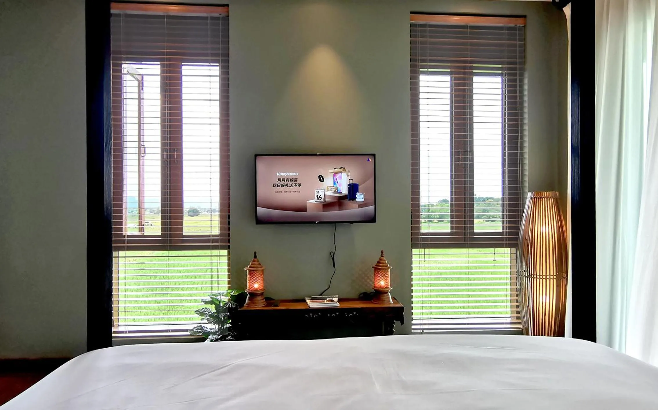 Communal lounge/ TV room, Bed in Rice Villa Chiang Mai