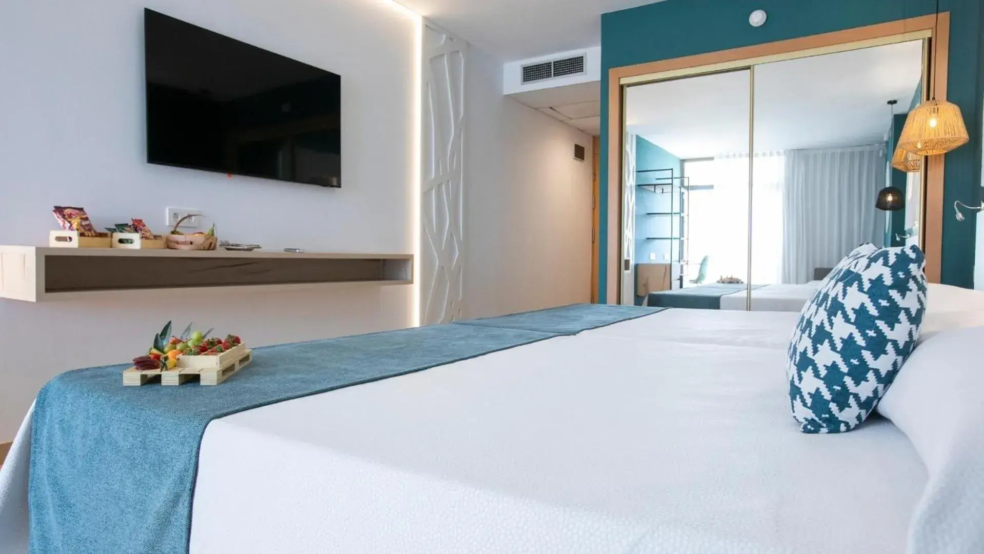 Photo of the whole room, Bed in Evenia Olympic Suites Photo of the whole room, Bed in Evenia Olympic Suites