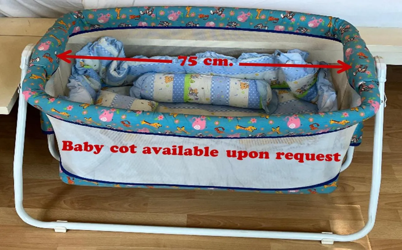 cot in Triple Palms House