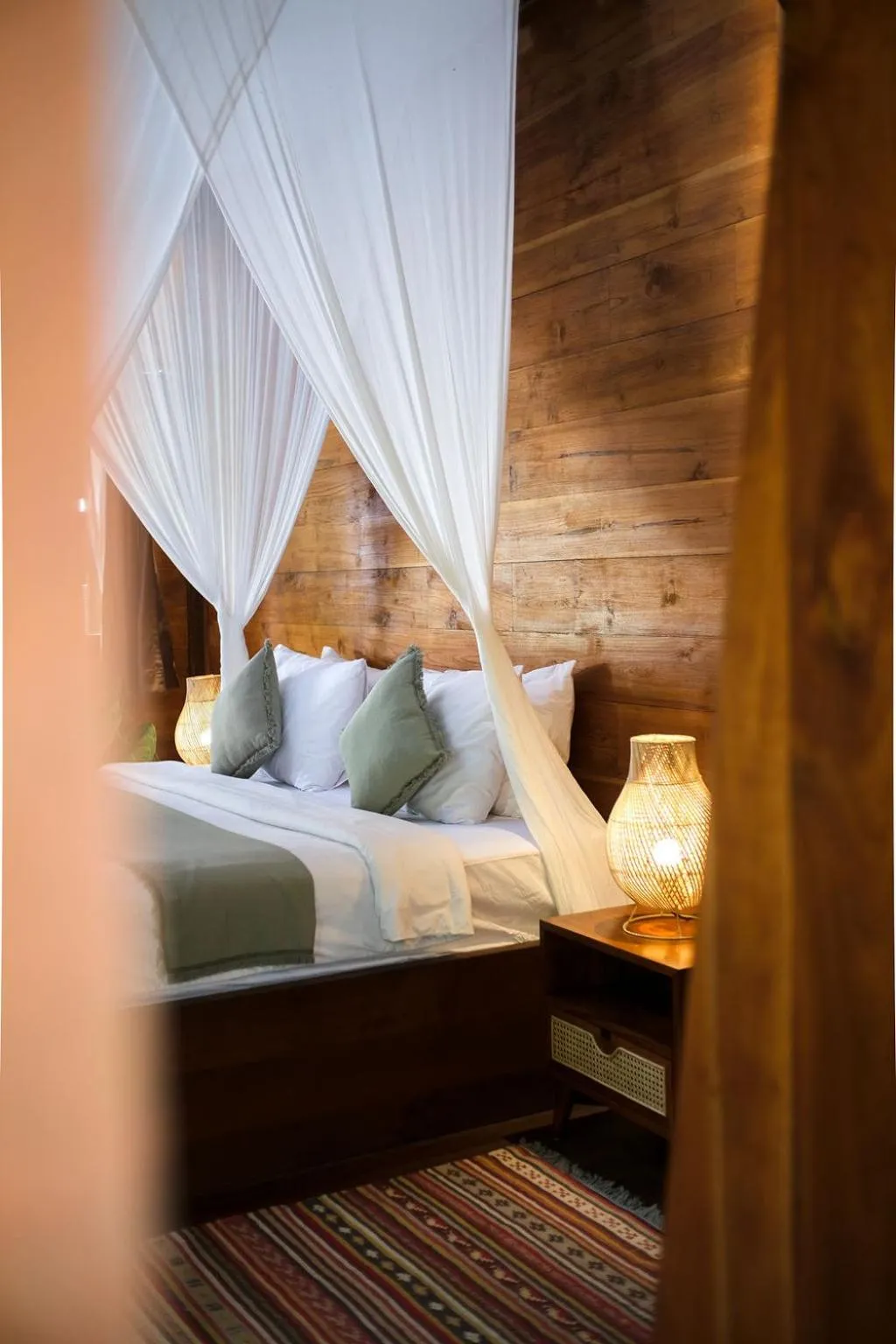 Bed in Kayu Mama Resort and Spa