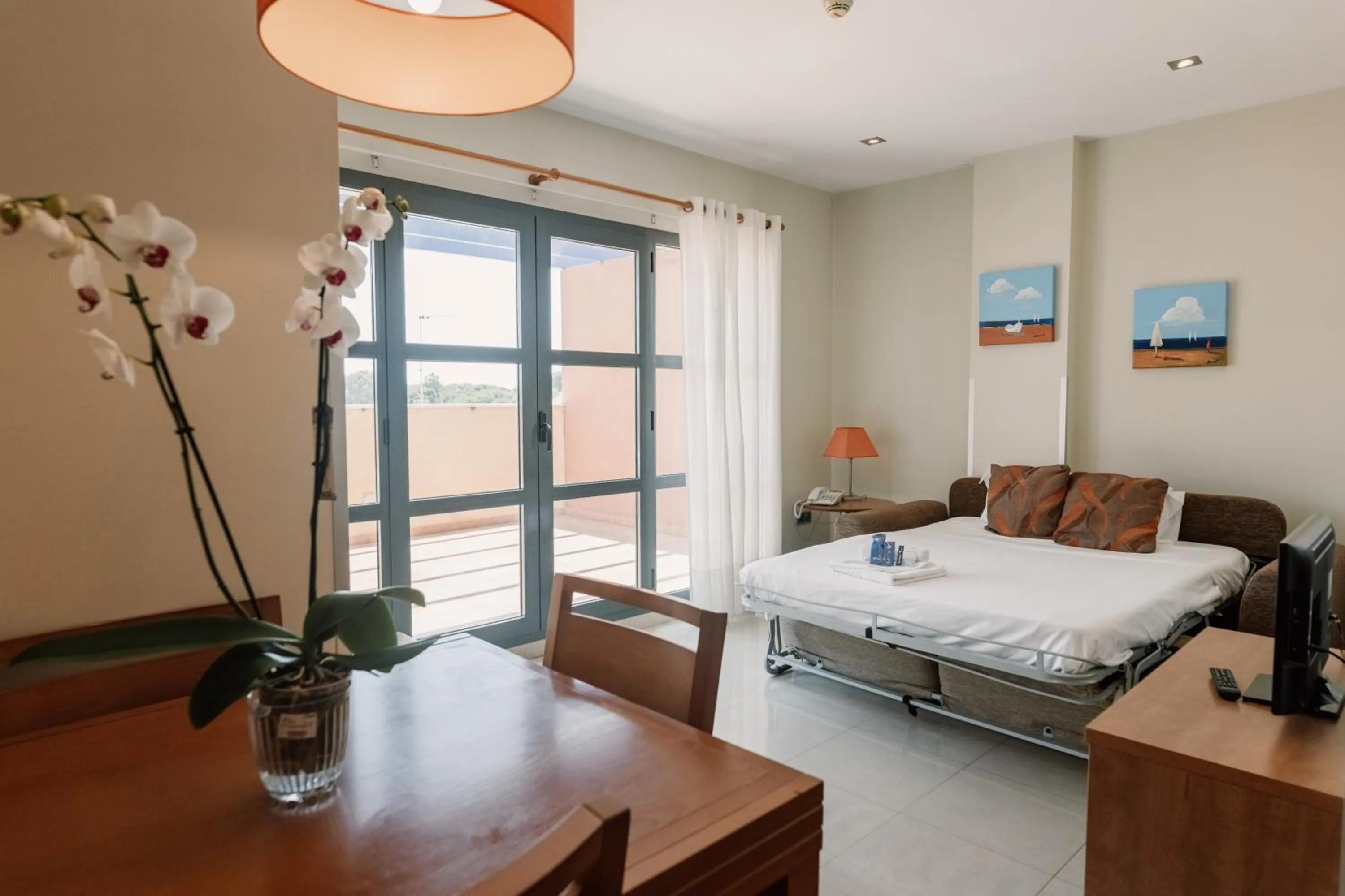 Living room, Bed in Aparthotel Bahía