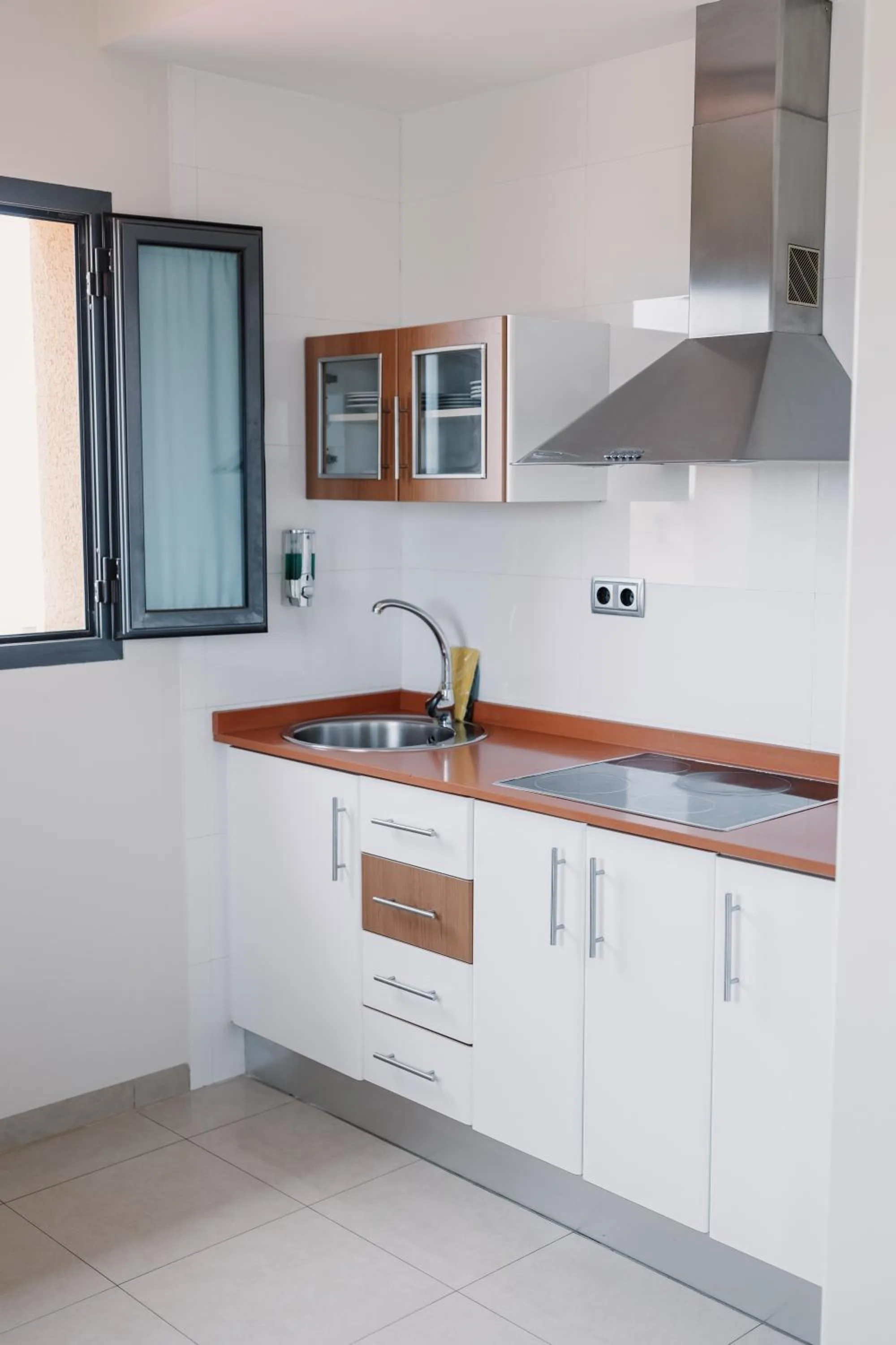 Kitchen or kitchenette in Aparthotel Bahía