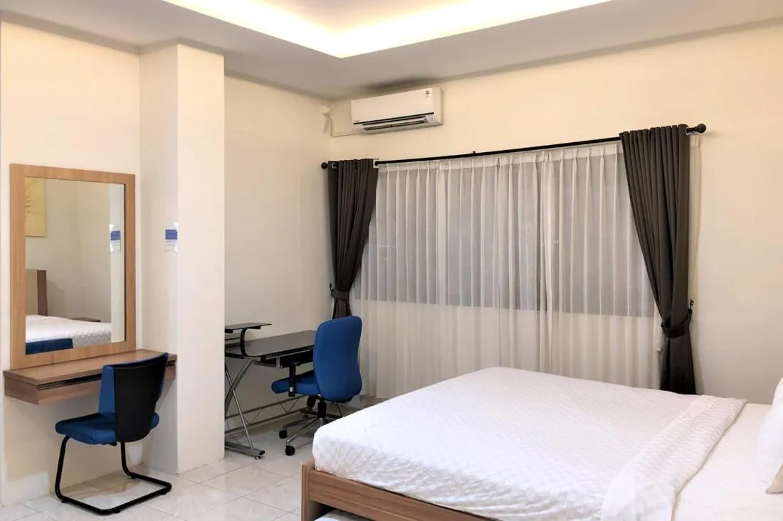 Bed in TwoSpaces Living at Residence 6