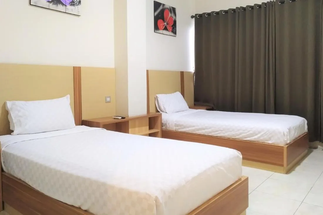 Bed in TwoSpaces Living at Residence 6