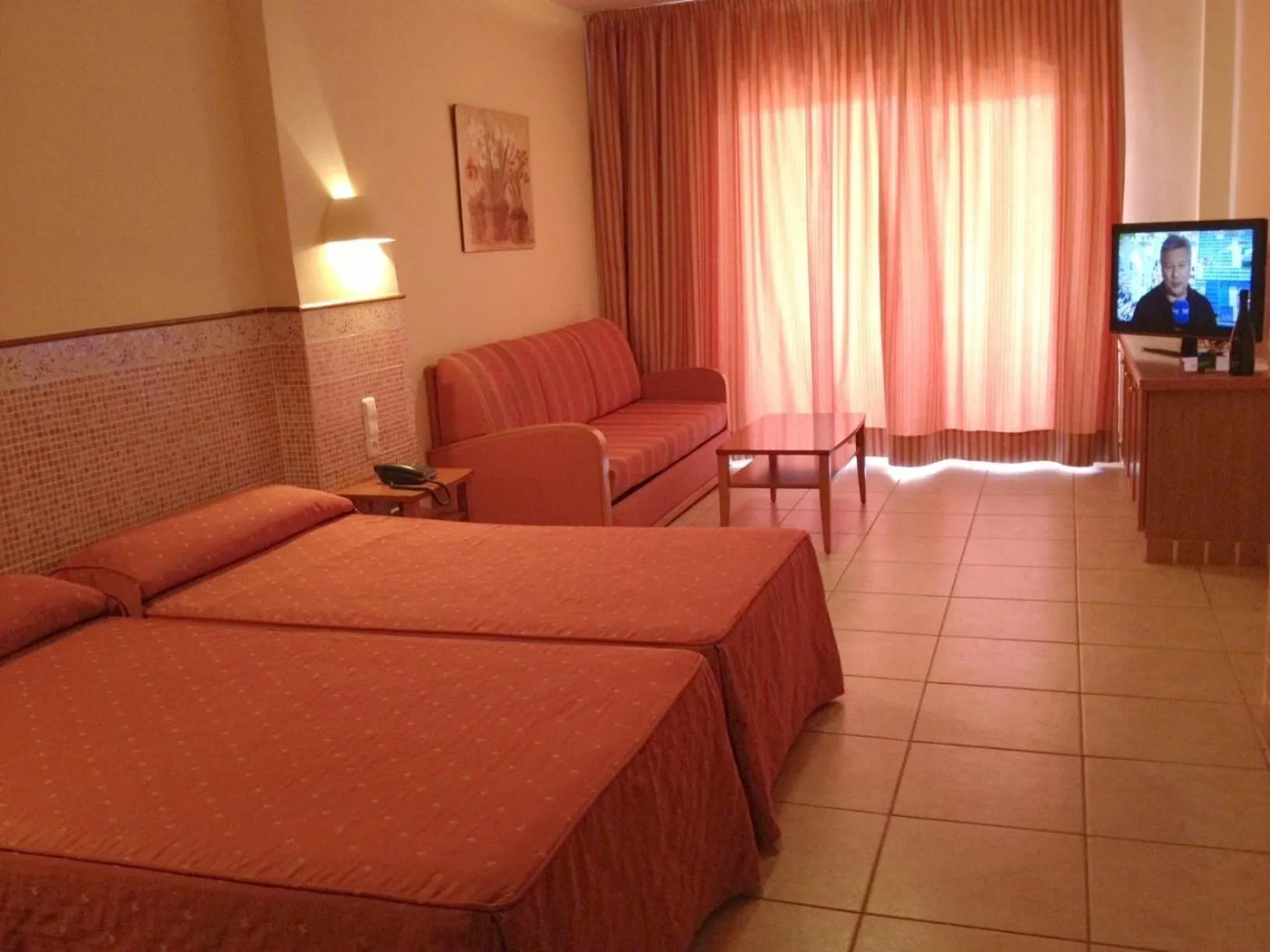 Photo of the whole room, Bed in Arena Center