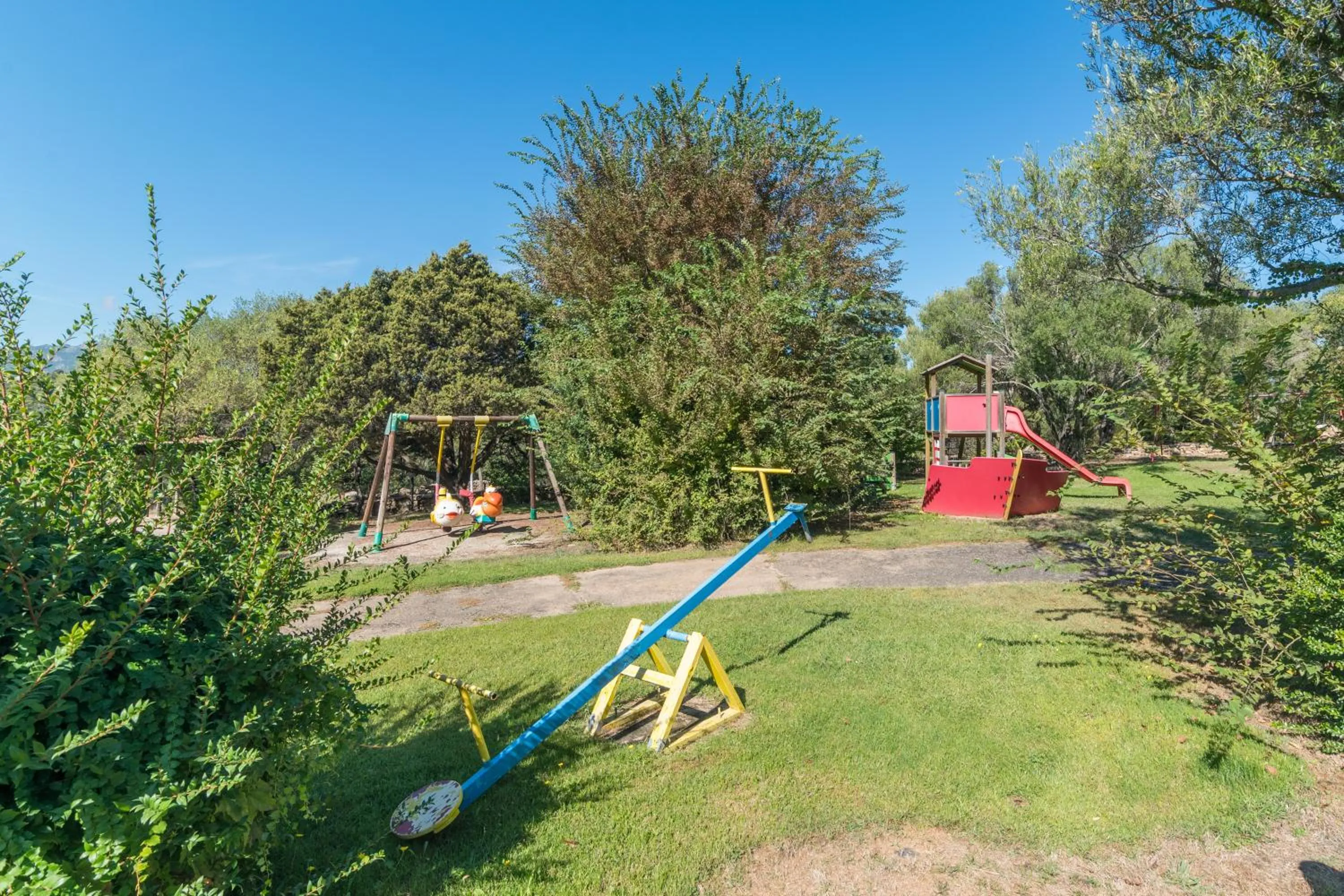 Children play ground in Casa Emozione With Shared Pool - Happy Rentals