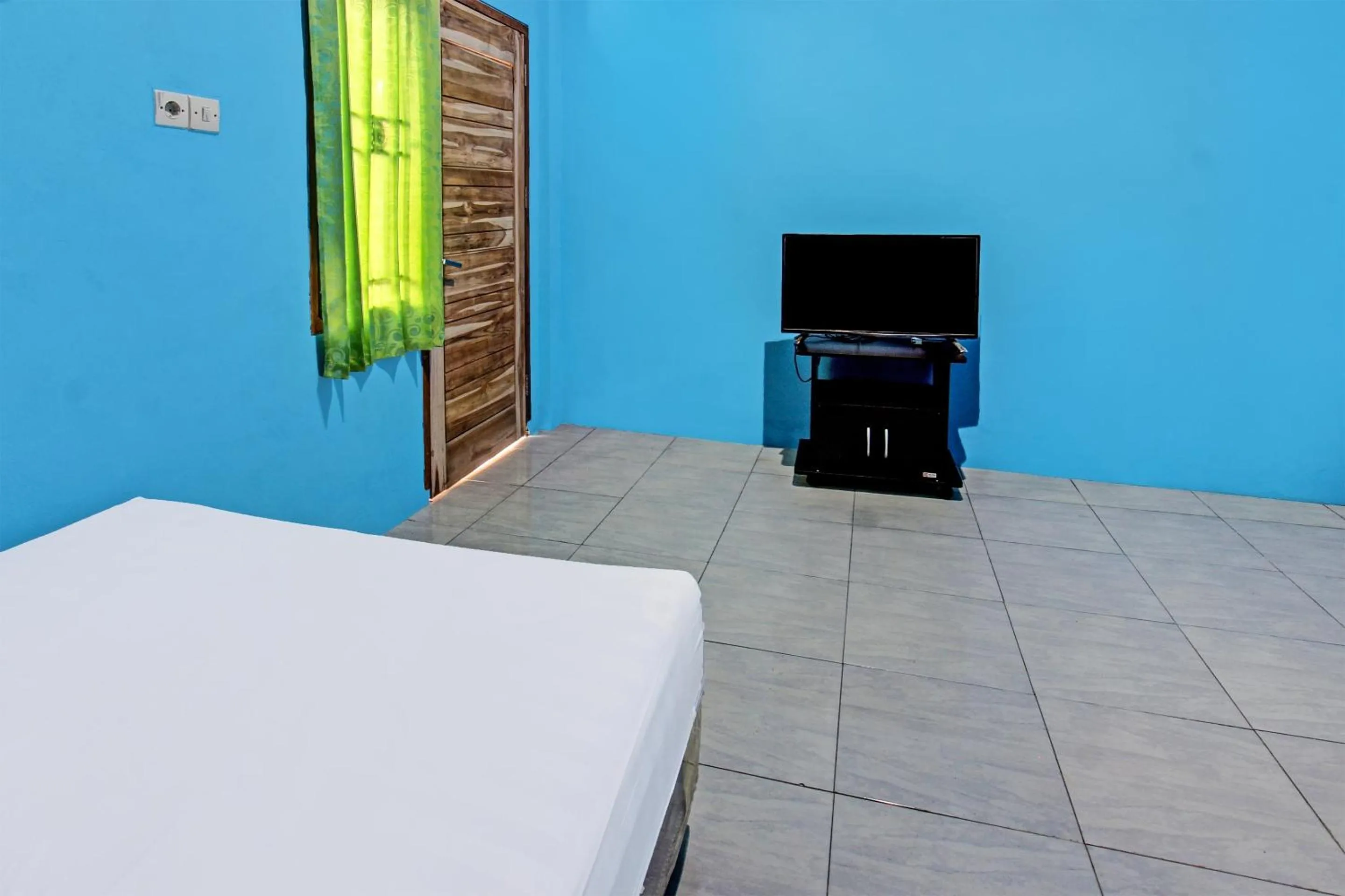 Bedroom in SPOT ON 91811 Rumah Inap Bunda Nurhayati