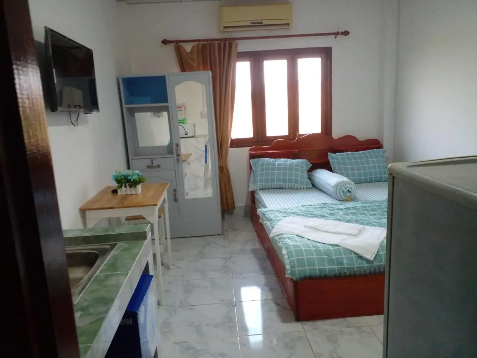 Bed in Ban Saylomleng Residence Bed in Ban Saylomleng Residence