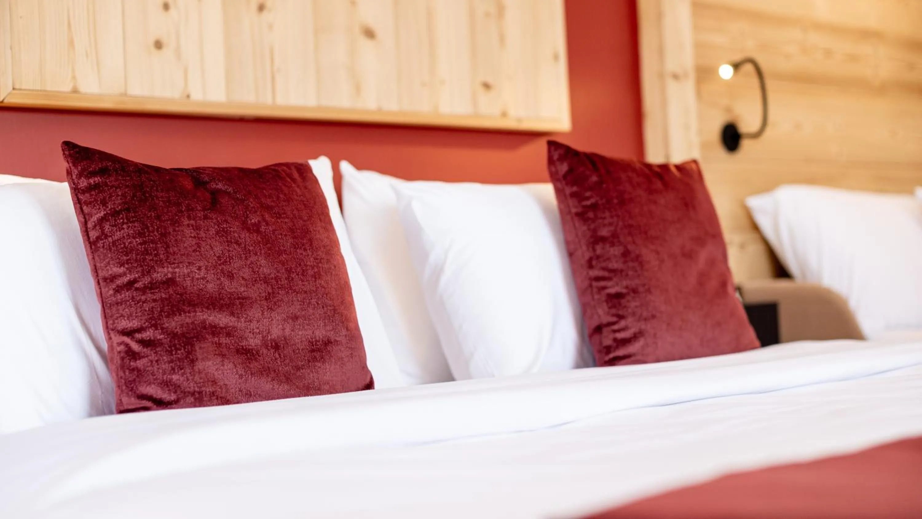 Bed in Madame Vacances Hotel Les Cimes