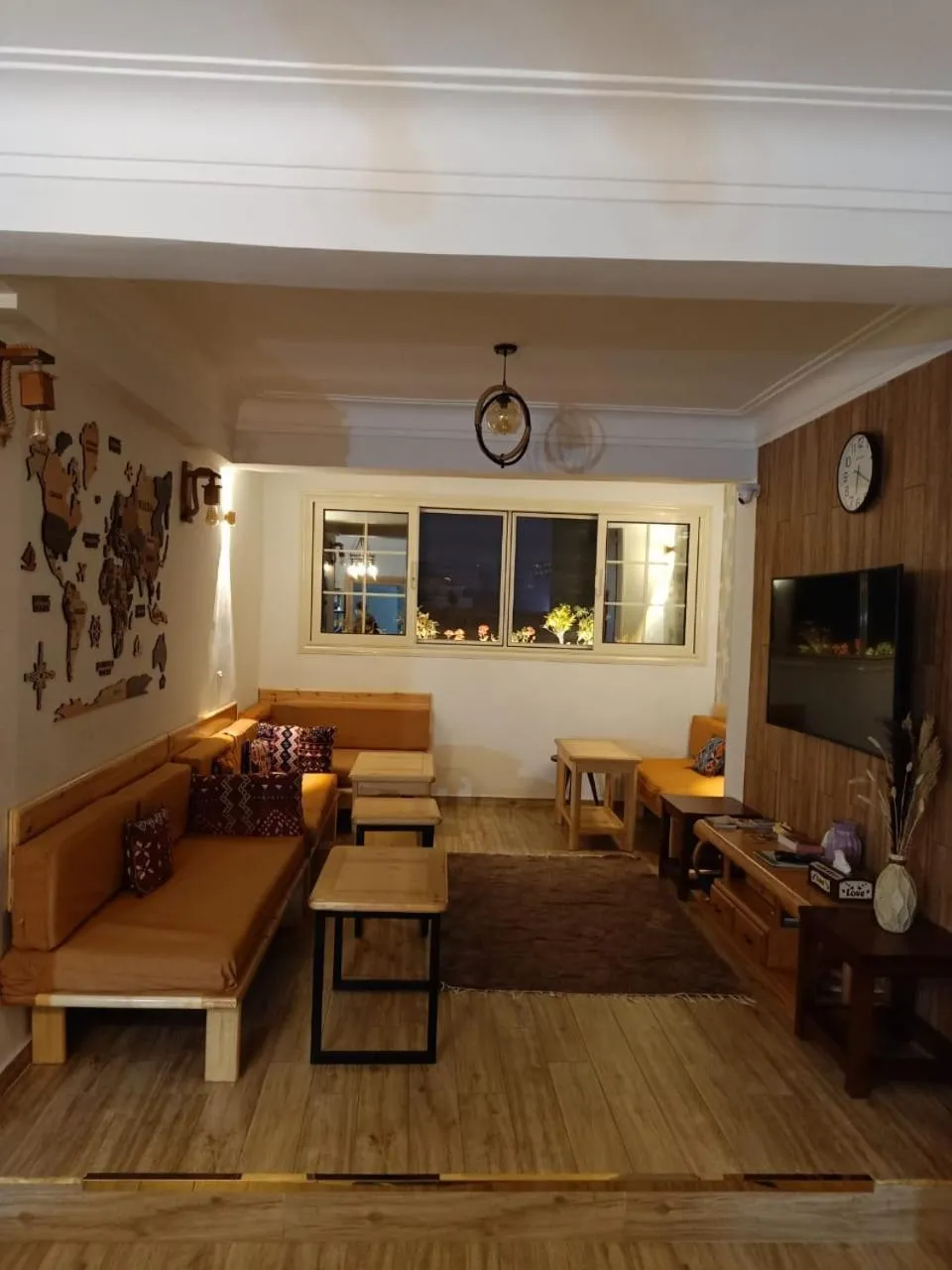 Communal lounge/ TV room in Champollion Hostel