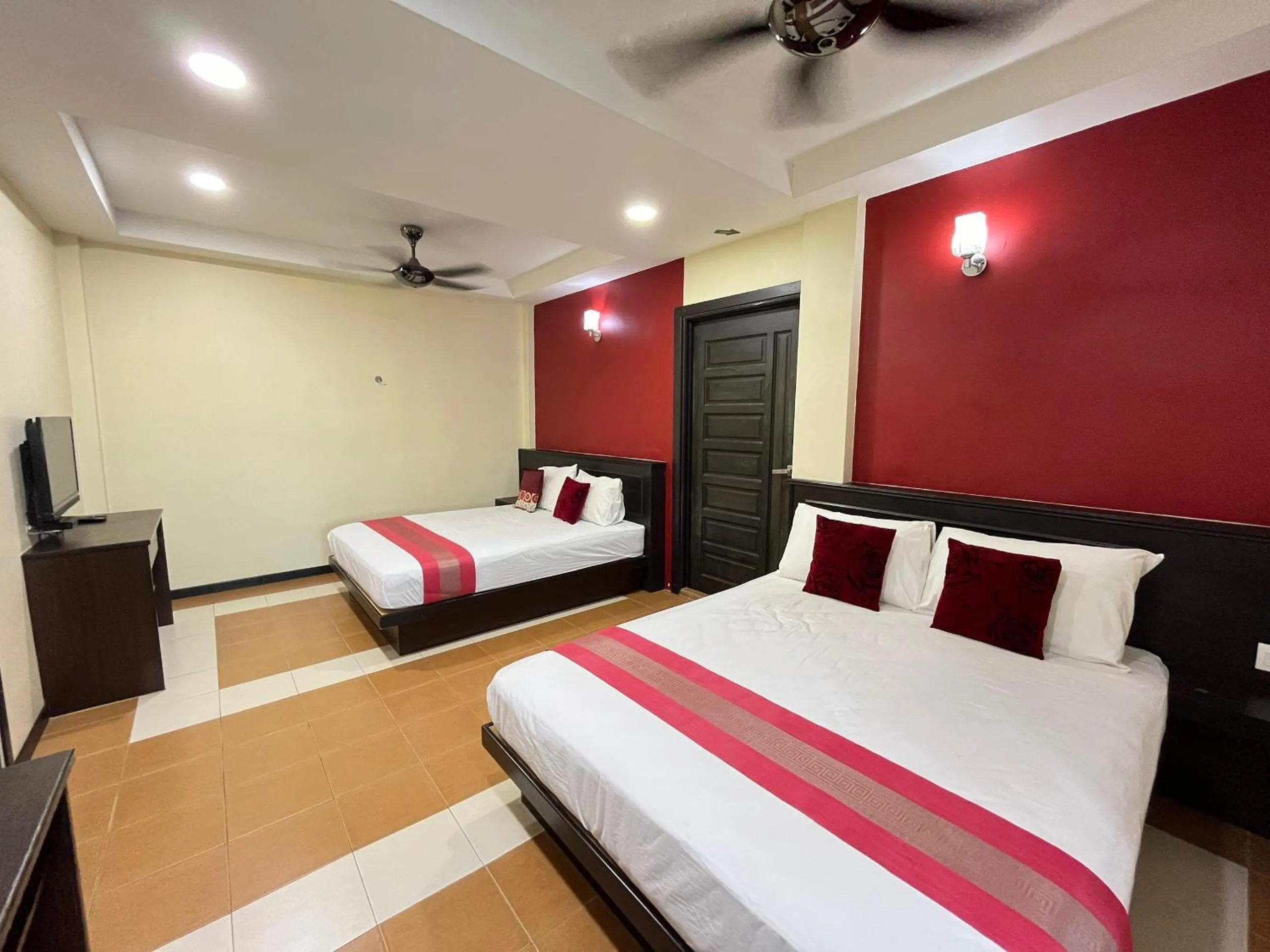 Bed in Sera Sentosa Inn